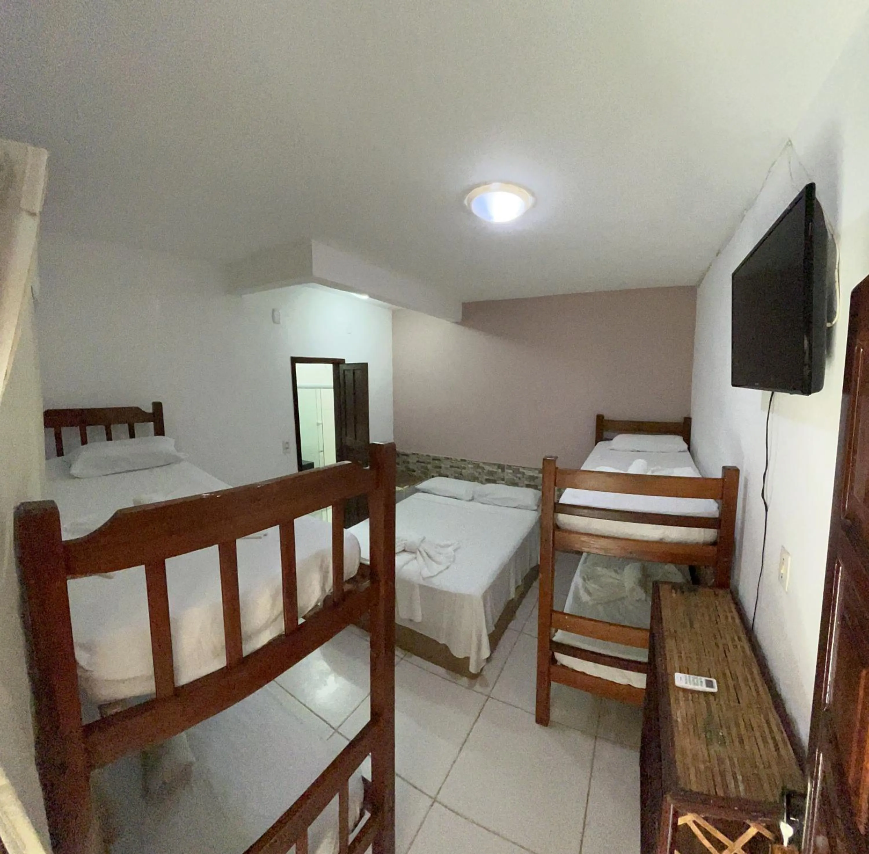 Photo of the whole room, Bed in Pousada Timbalada