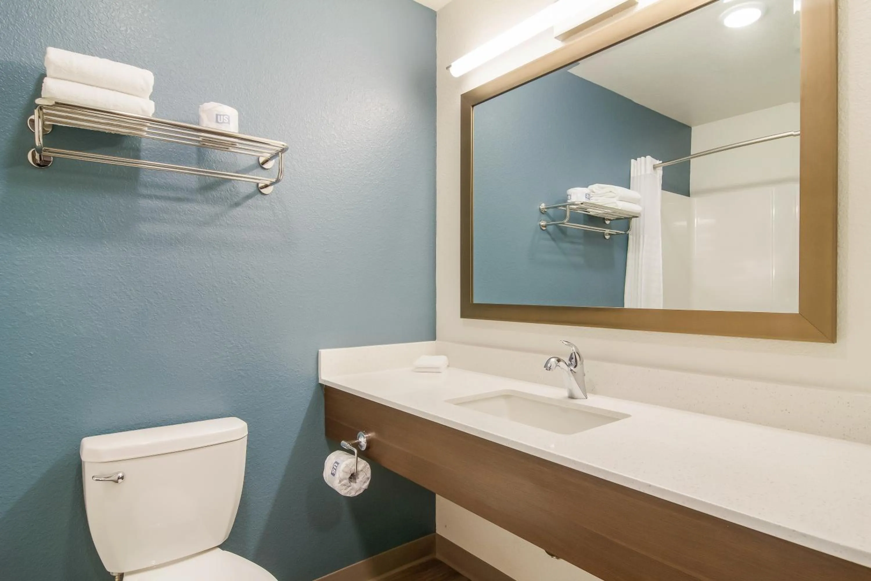 Bathroom in WoodSpring Suites Greensboro - High Point North