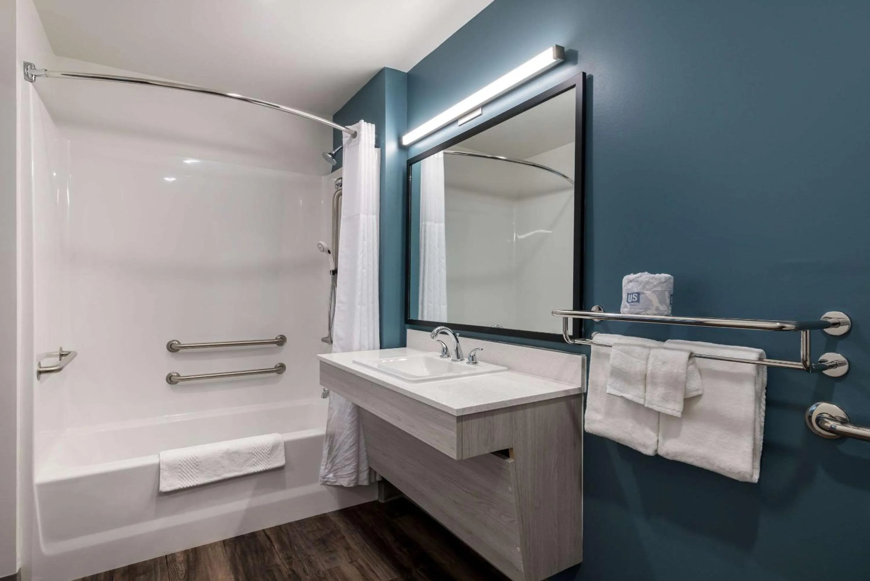 Bathroom in WoodSpring Suites Greensboro - High Point North