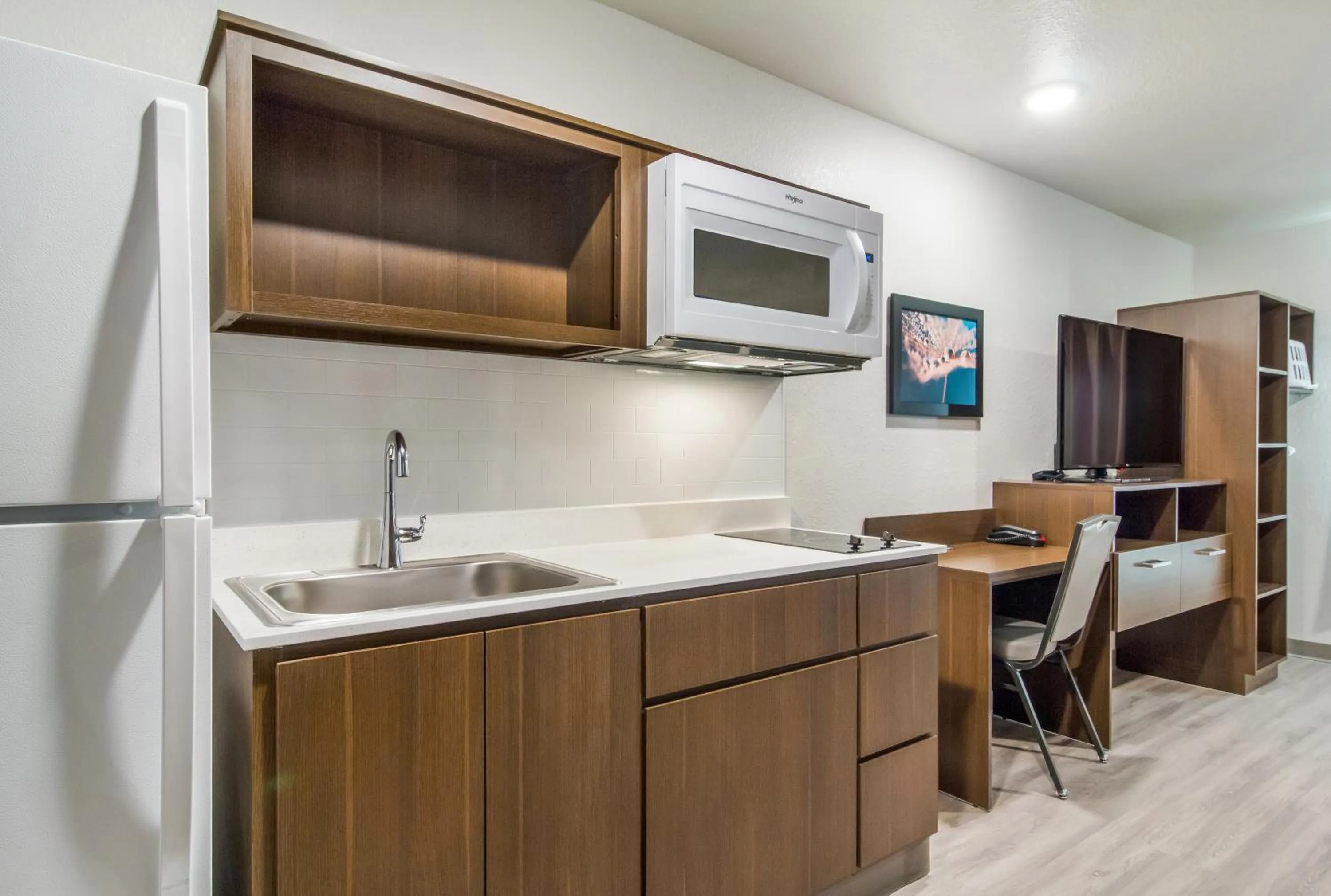 Kitchen or kitchenette in WoodSpring Suites Greensboro - High Point North