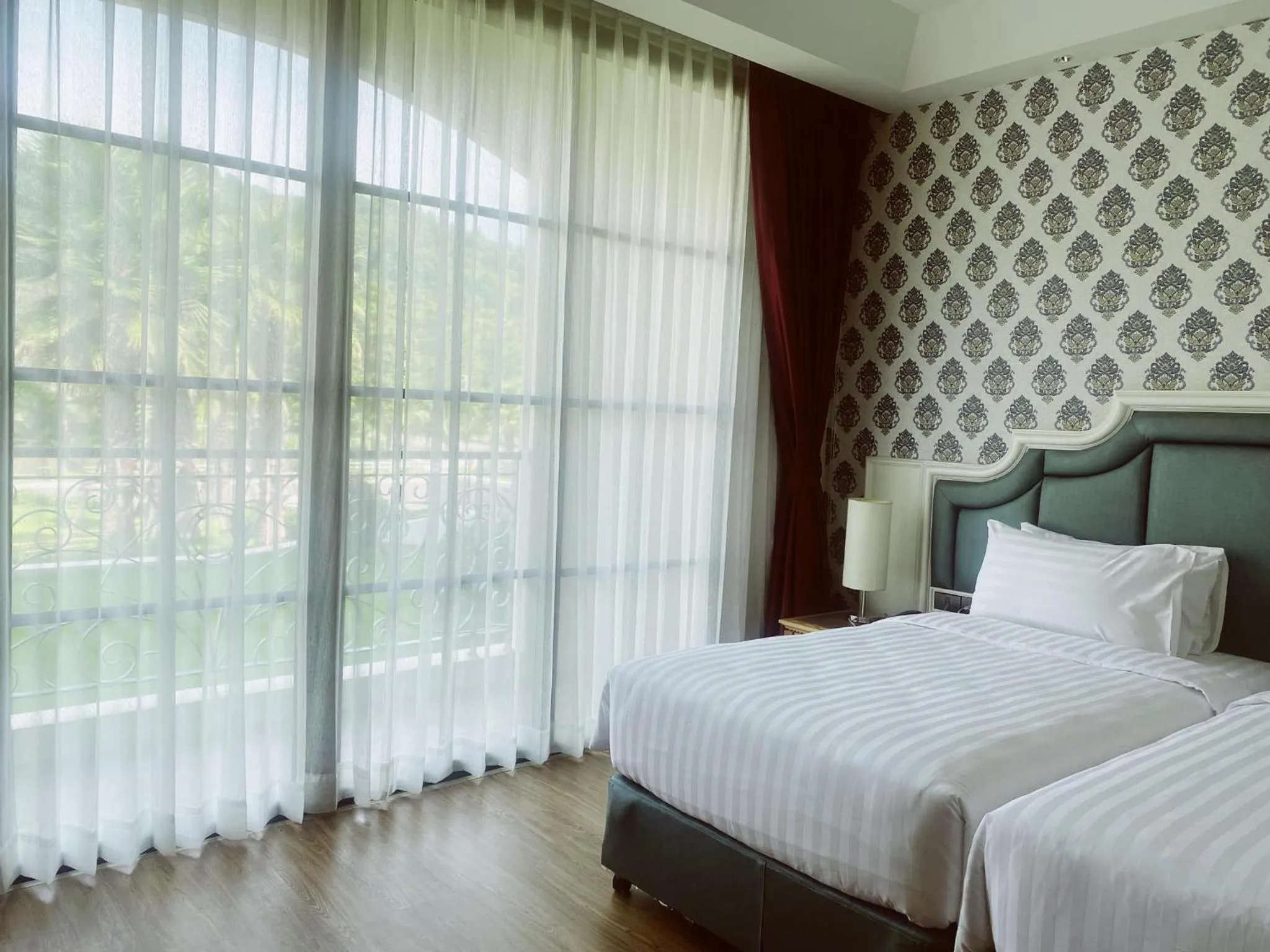 Bedroom, Bed in Grand Lord Hotel & Residence - Pattaya