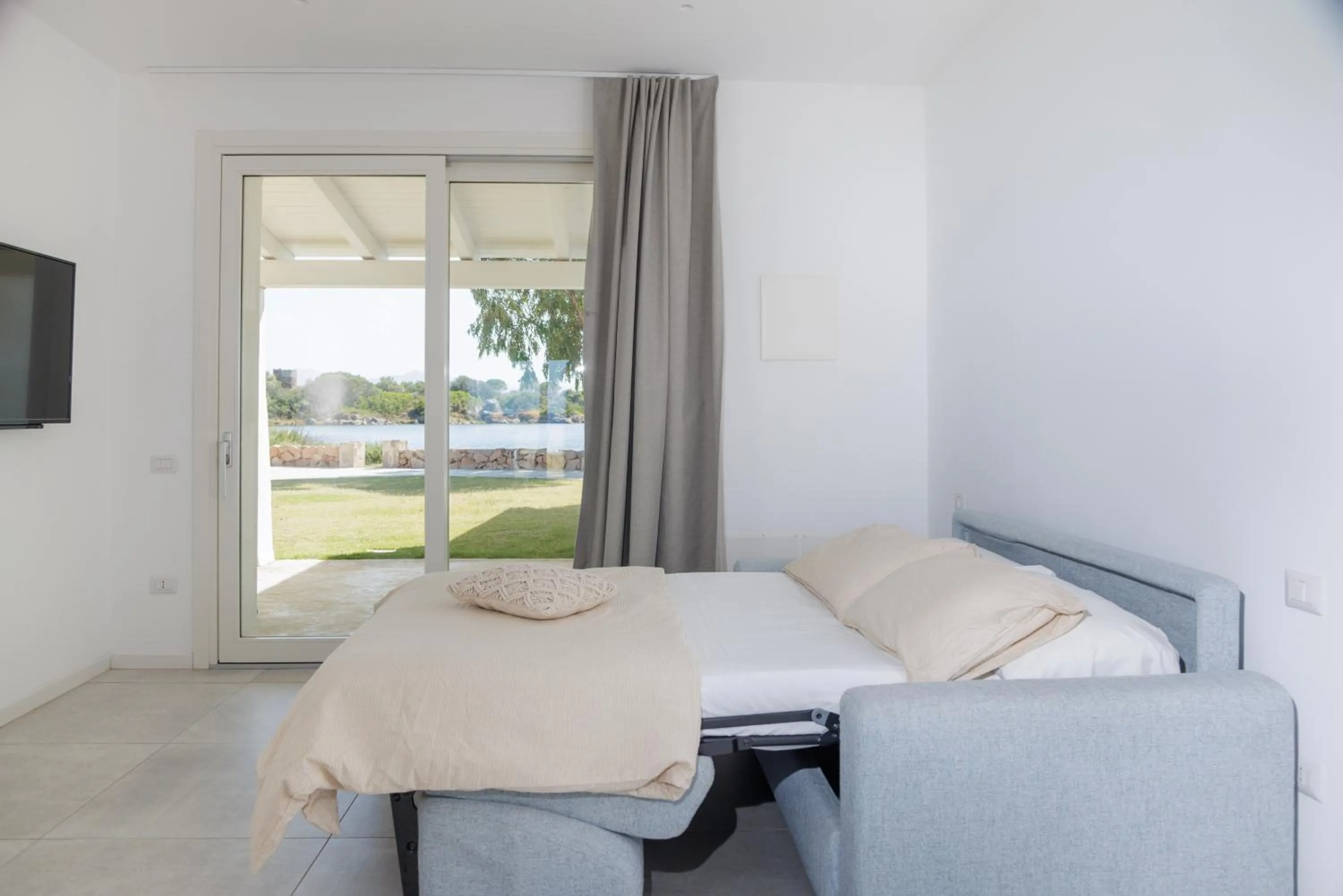 Living room, Bed in Baia del Sole Resort