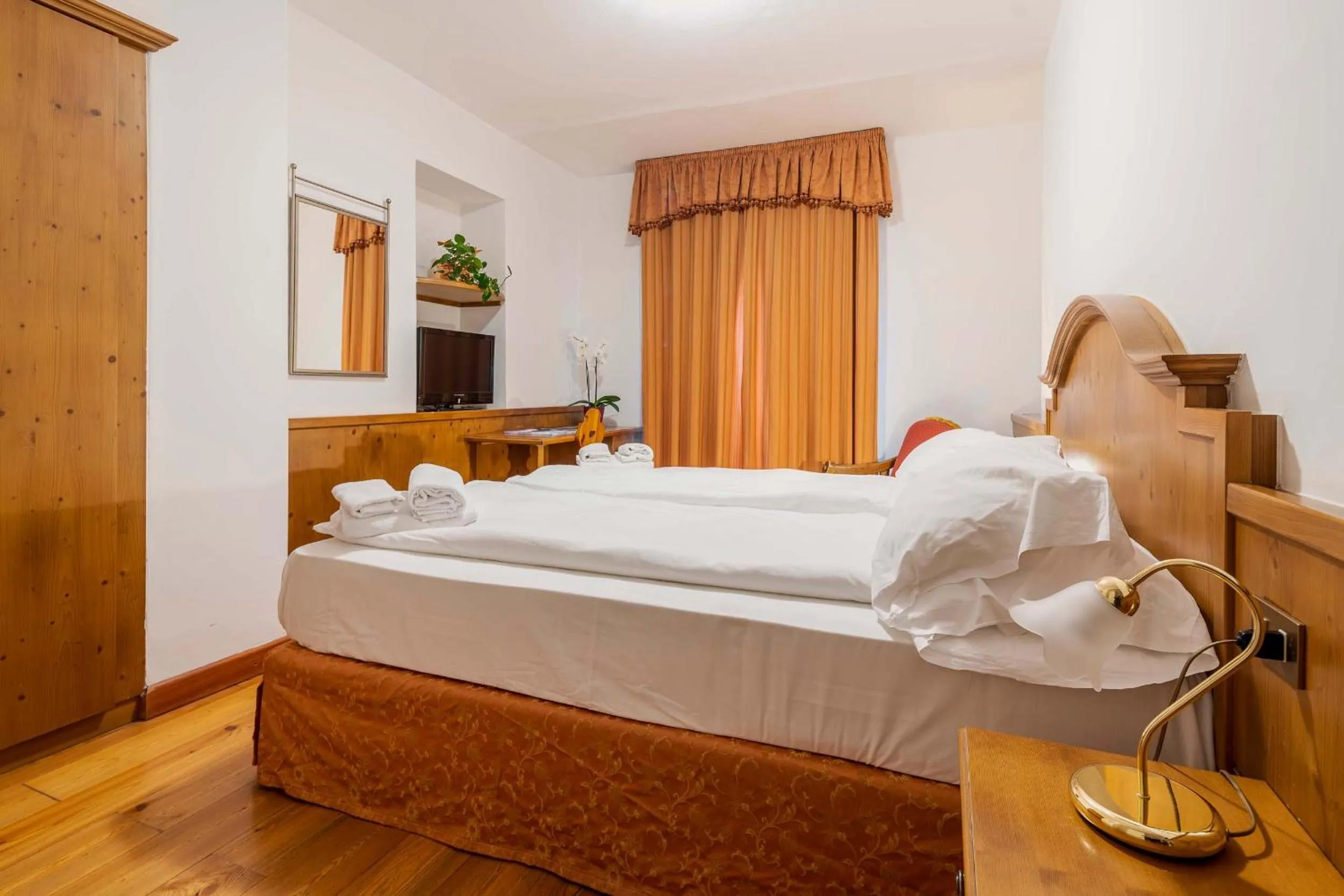 Bed in Royal Hotel Cortina