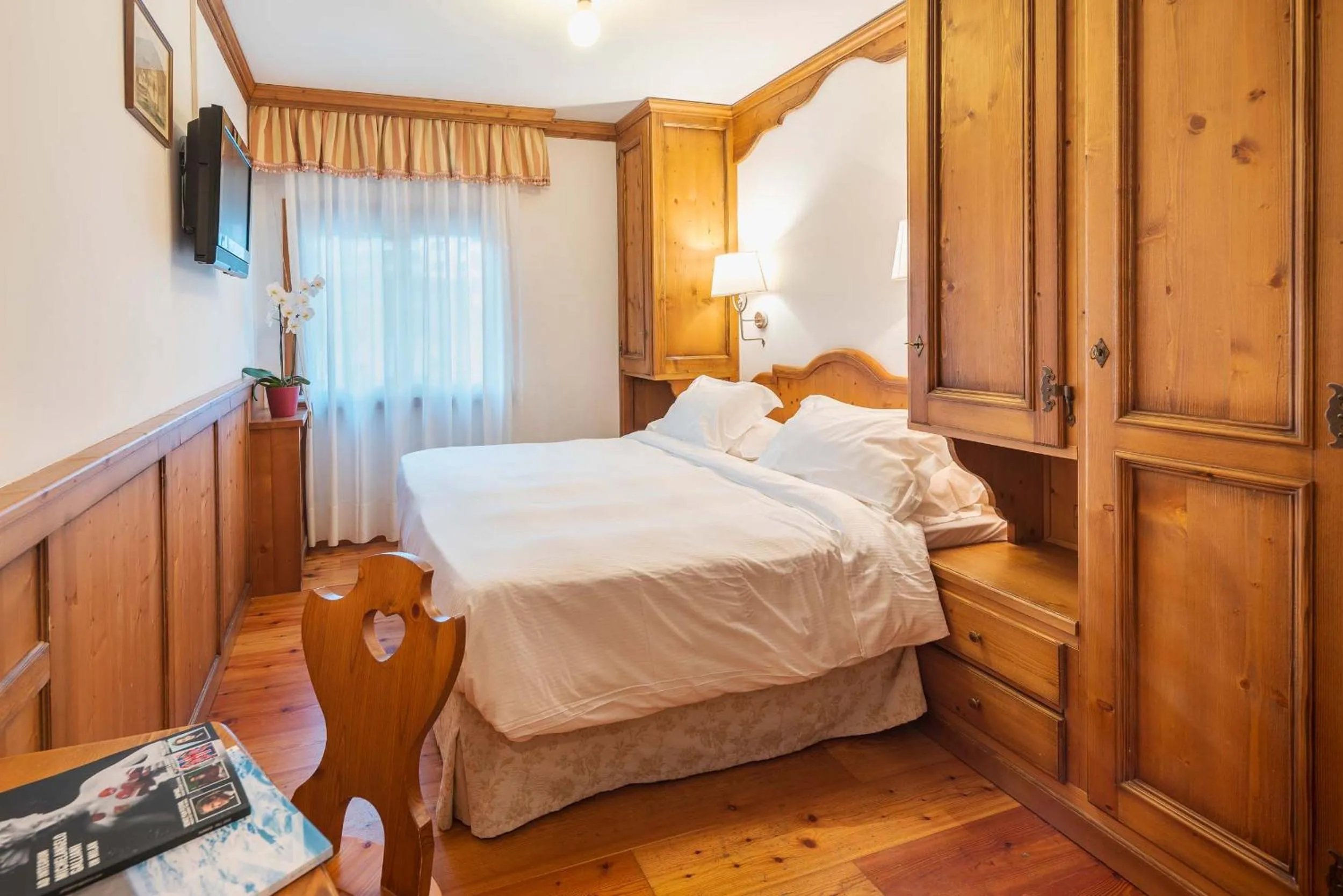 Bed in Royal Hotel Cortina