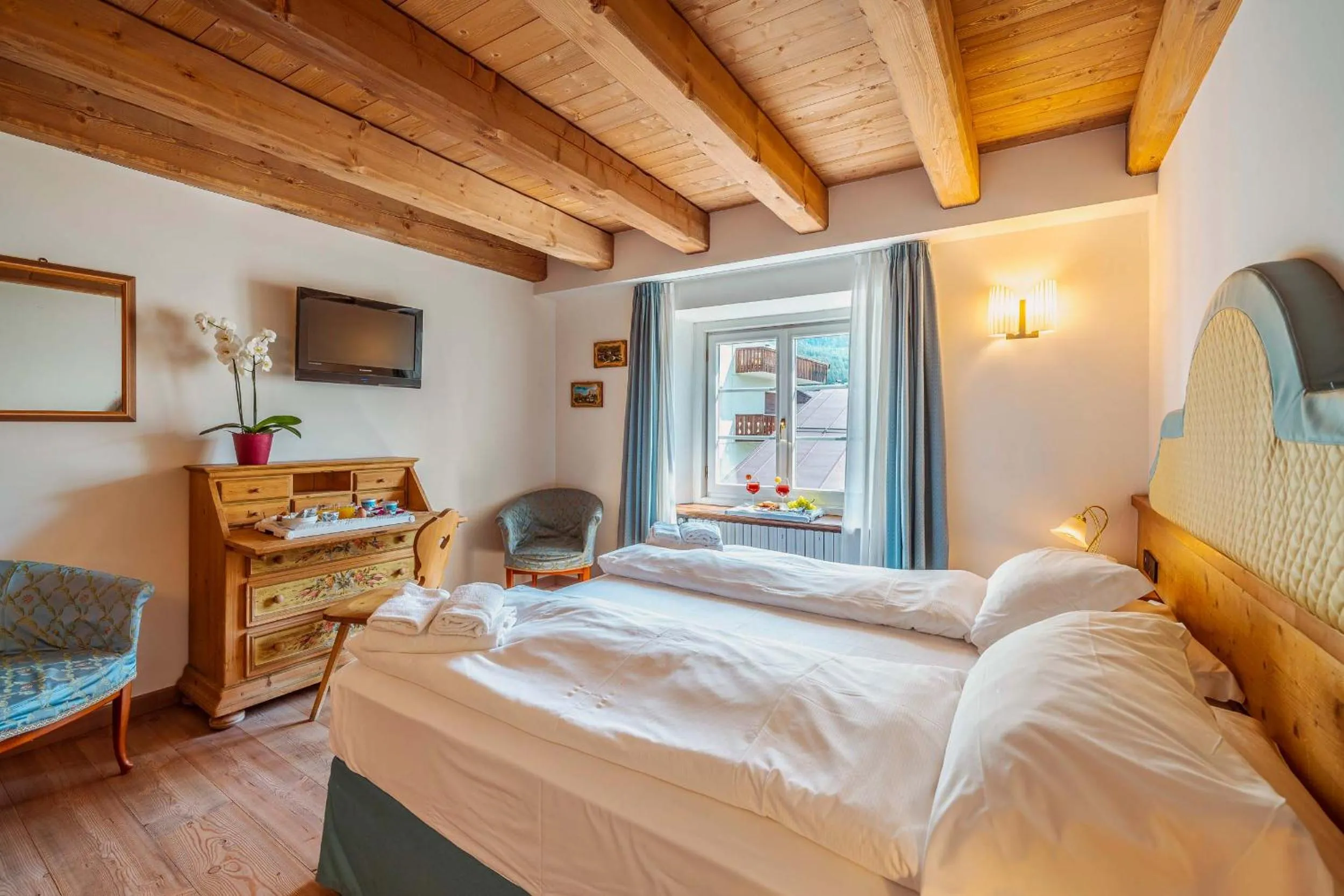 Bed in Royal Hotel Cortina