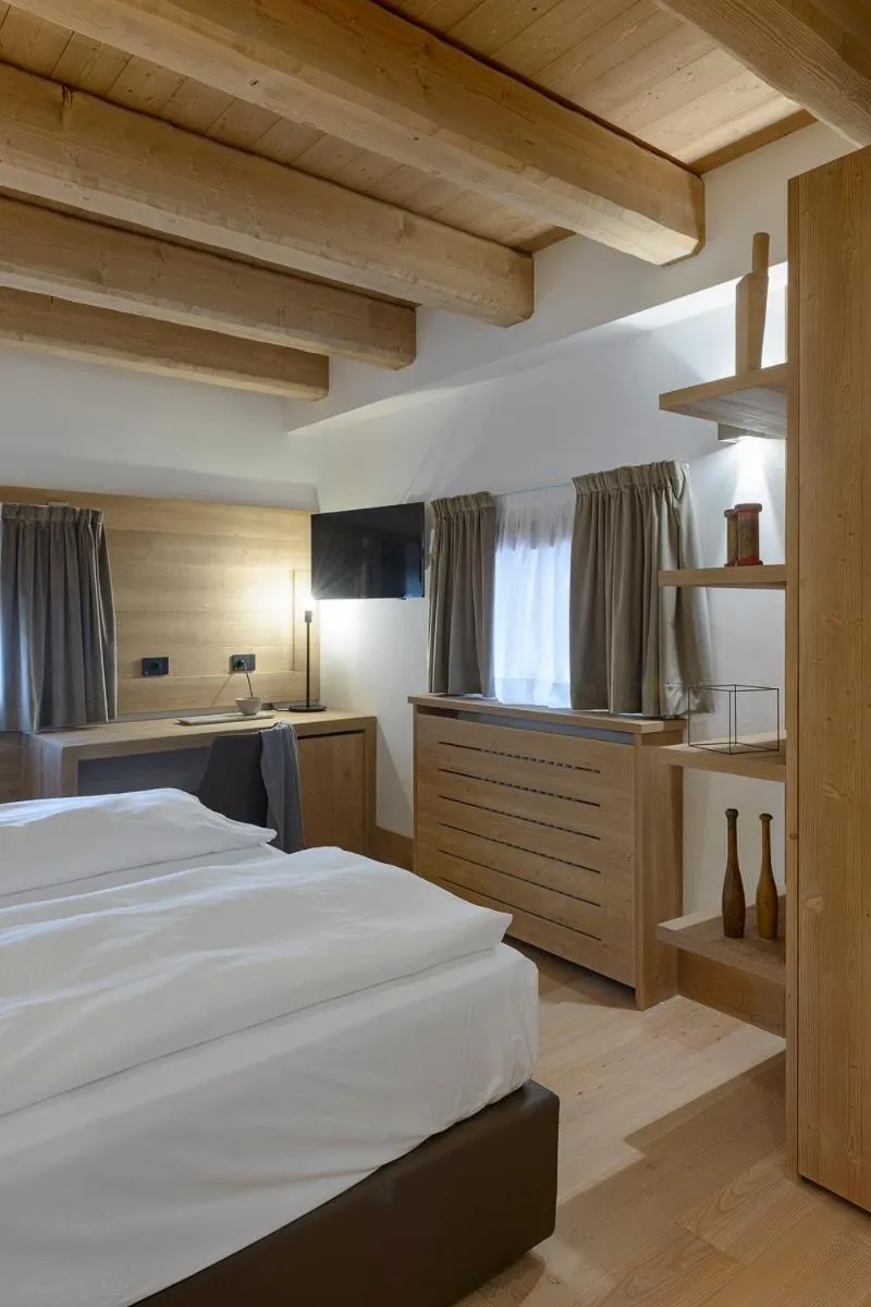 Bed in Royal Hotel Cortina