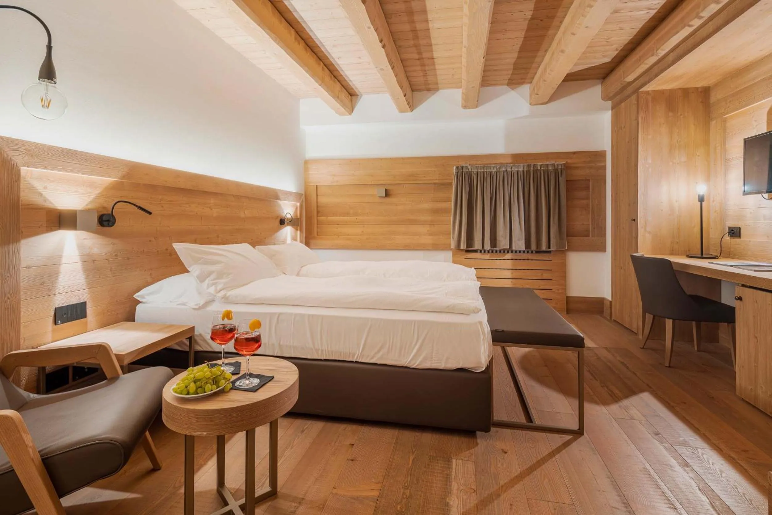 Bed in Royal Hotel Cortina