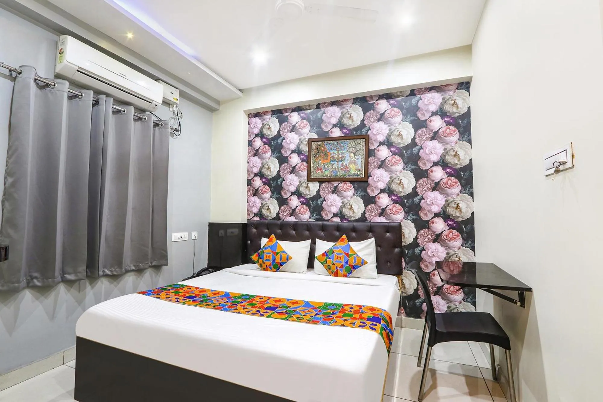 Bed in FabHotel Galaxy Suites