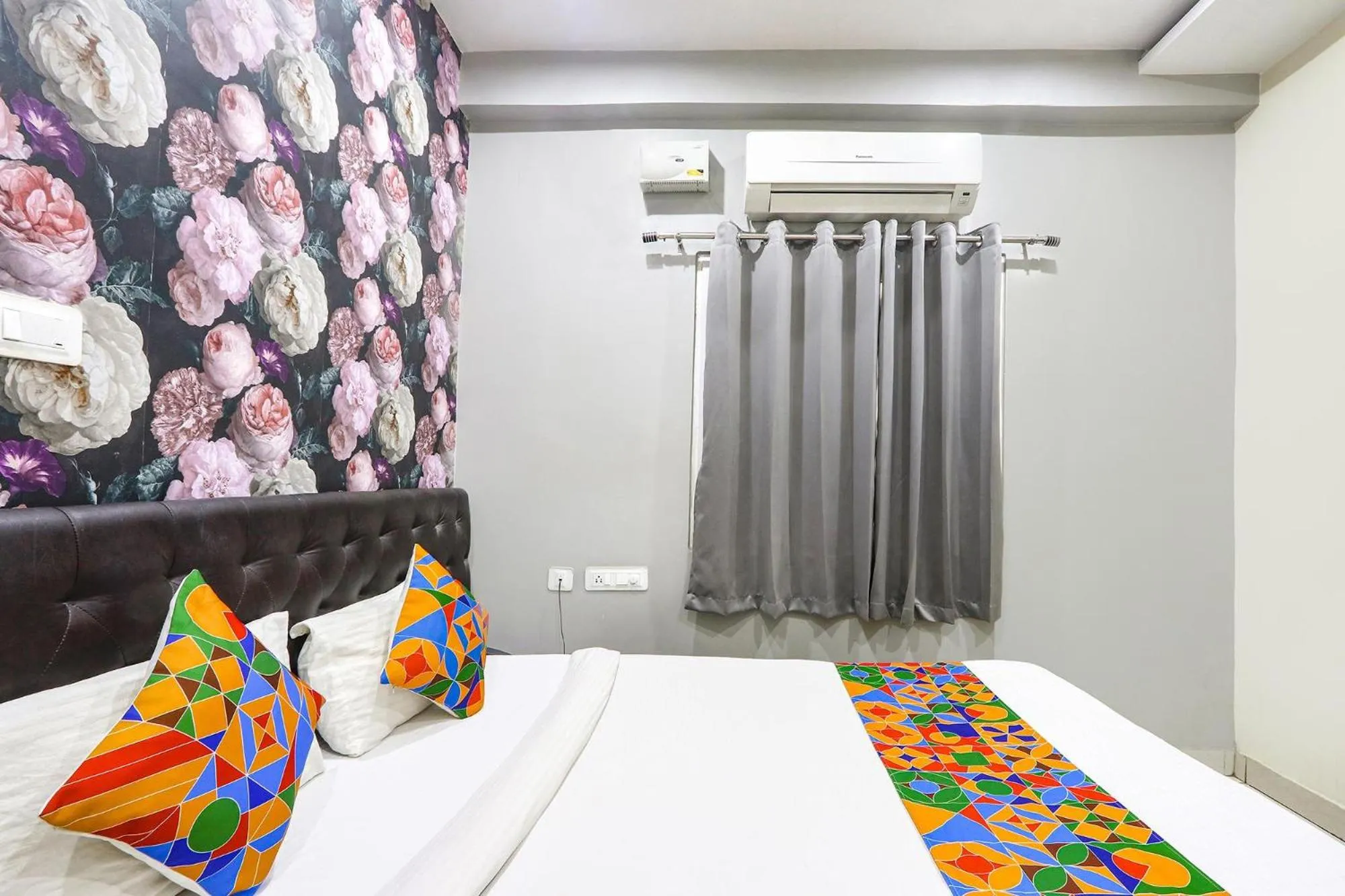 Bed in FabHotel Galaxy Suites