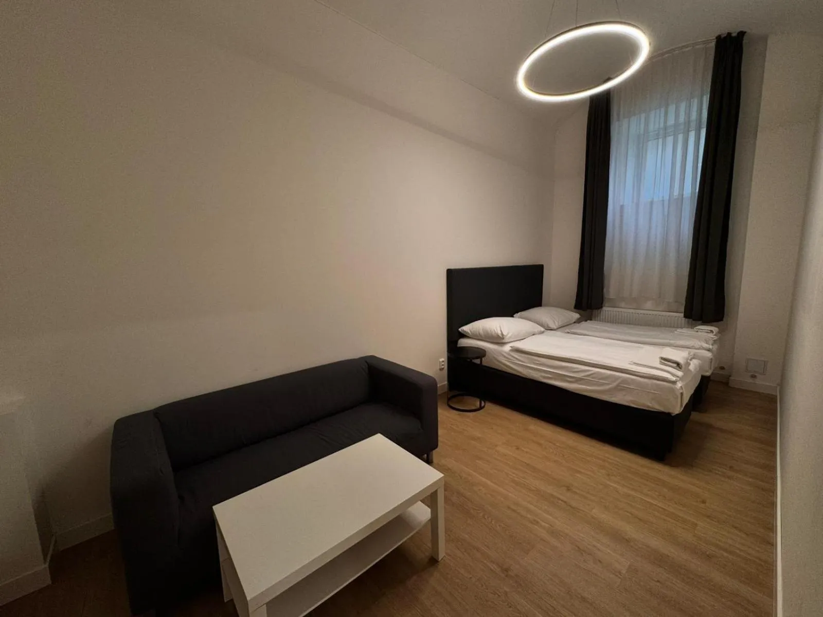 Bed in Figaro Suites