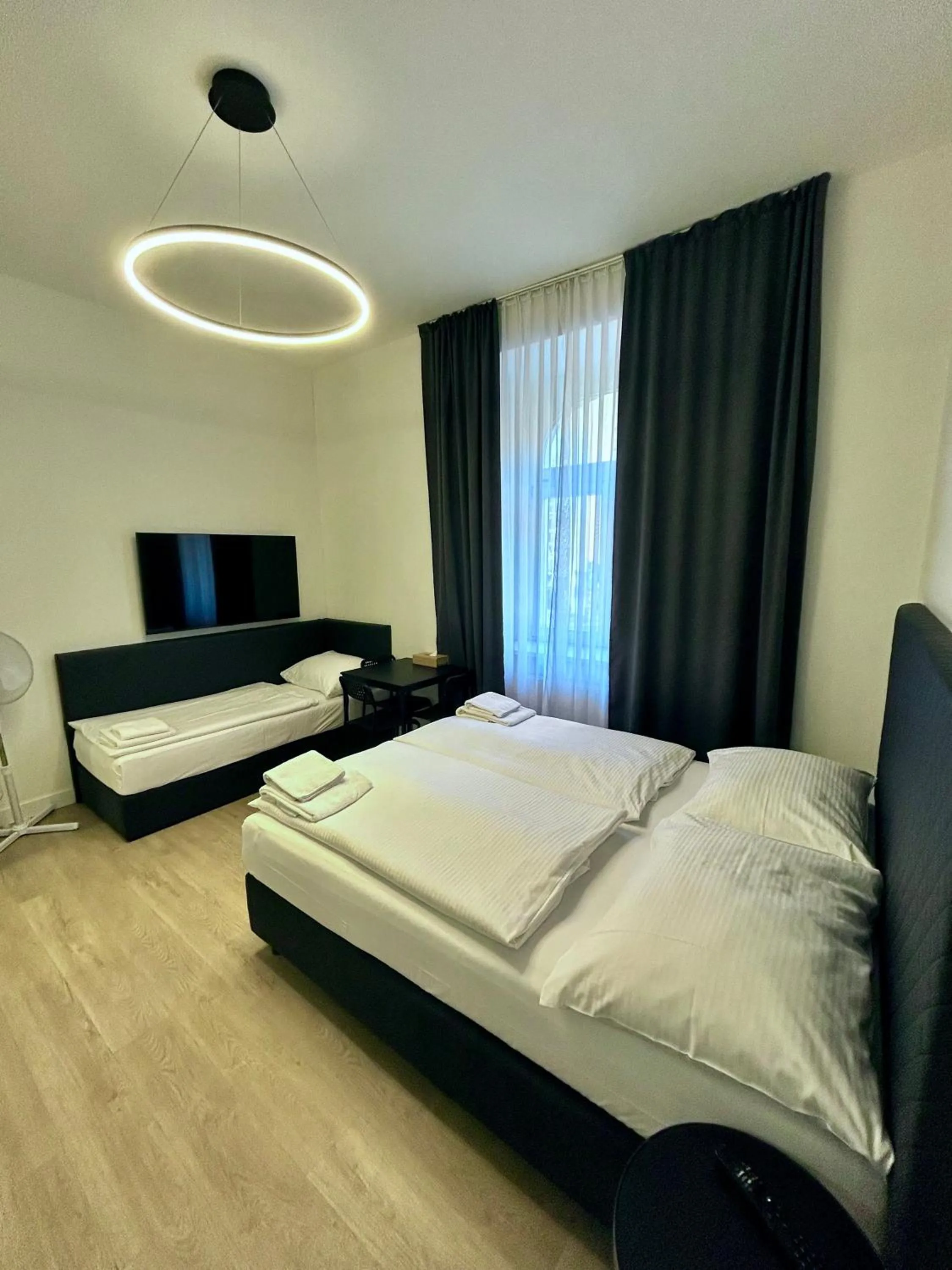 Bed in Figaro Suites