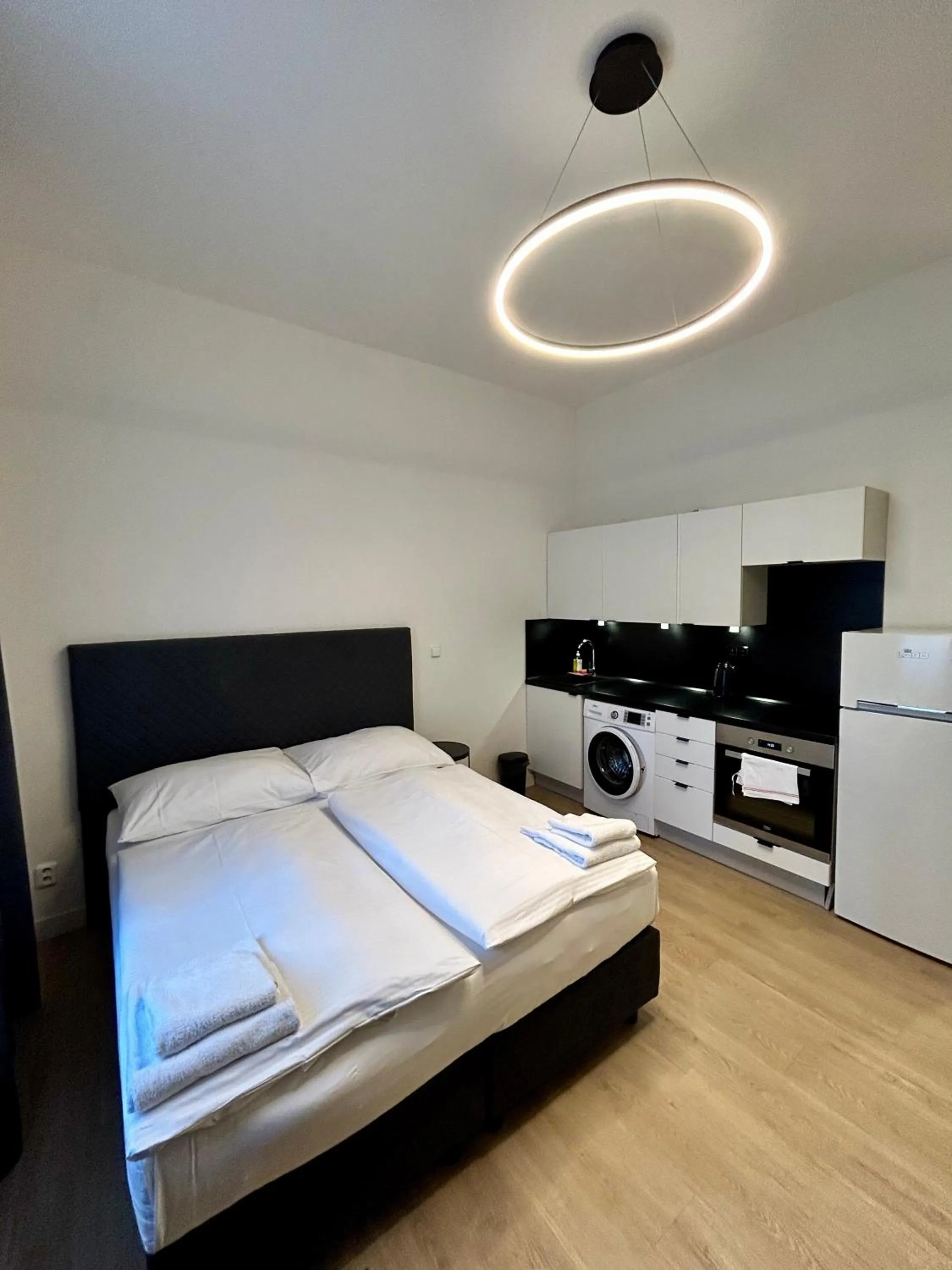 Bed in Figaro Suites