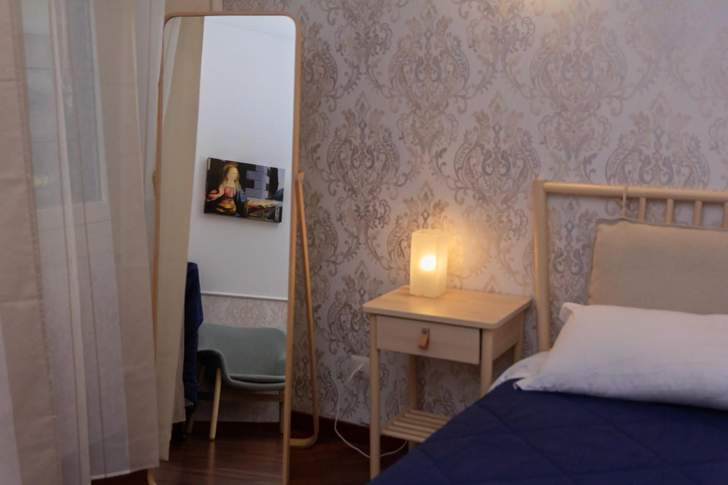 Decorative detail, Bed in Aurelio Deluxe Rooms