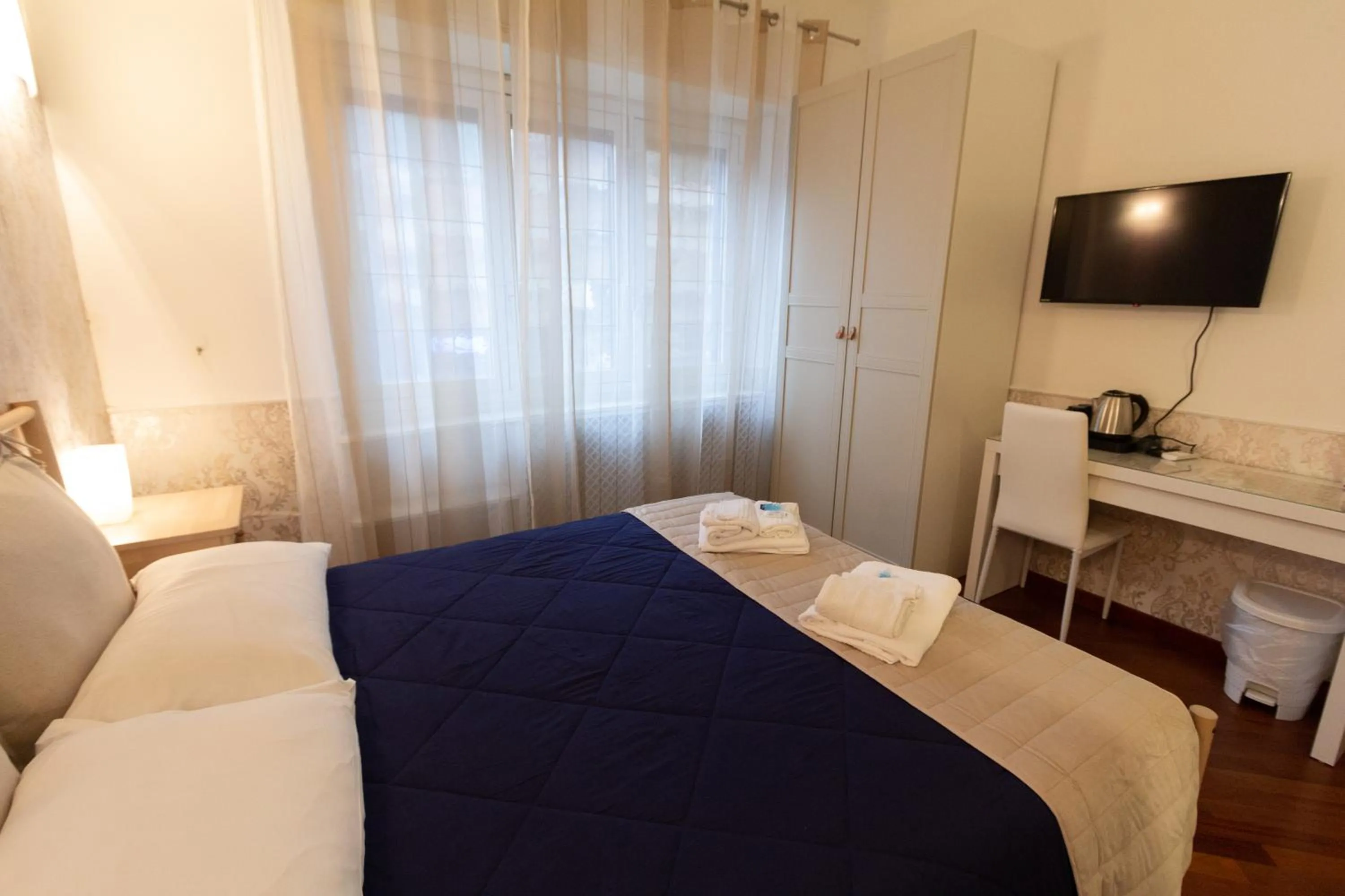 Bedroom, Bed in Aurelio Deluxe Rooms