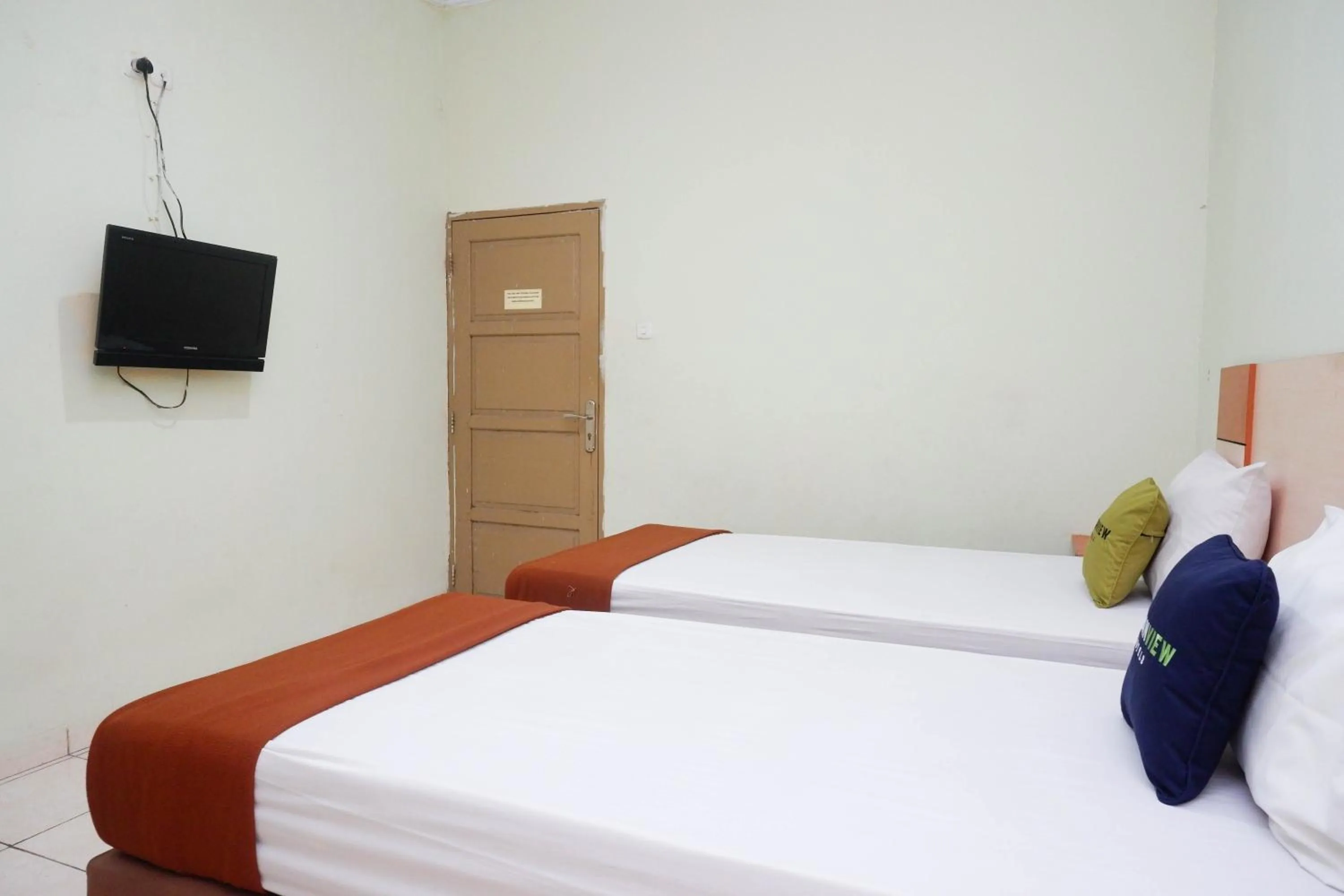 Bedroom, Bed in Urbanview Hotel Platinum Parepare