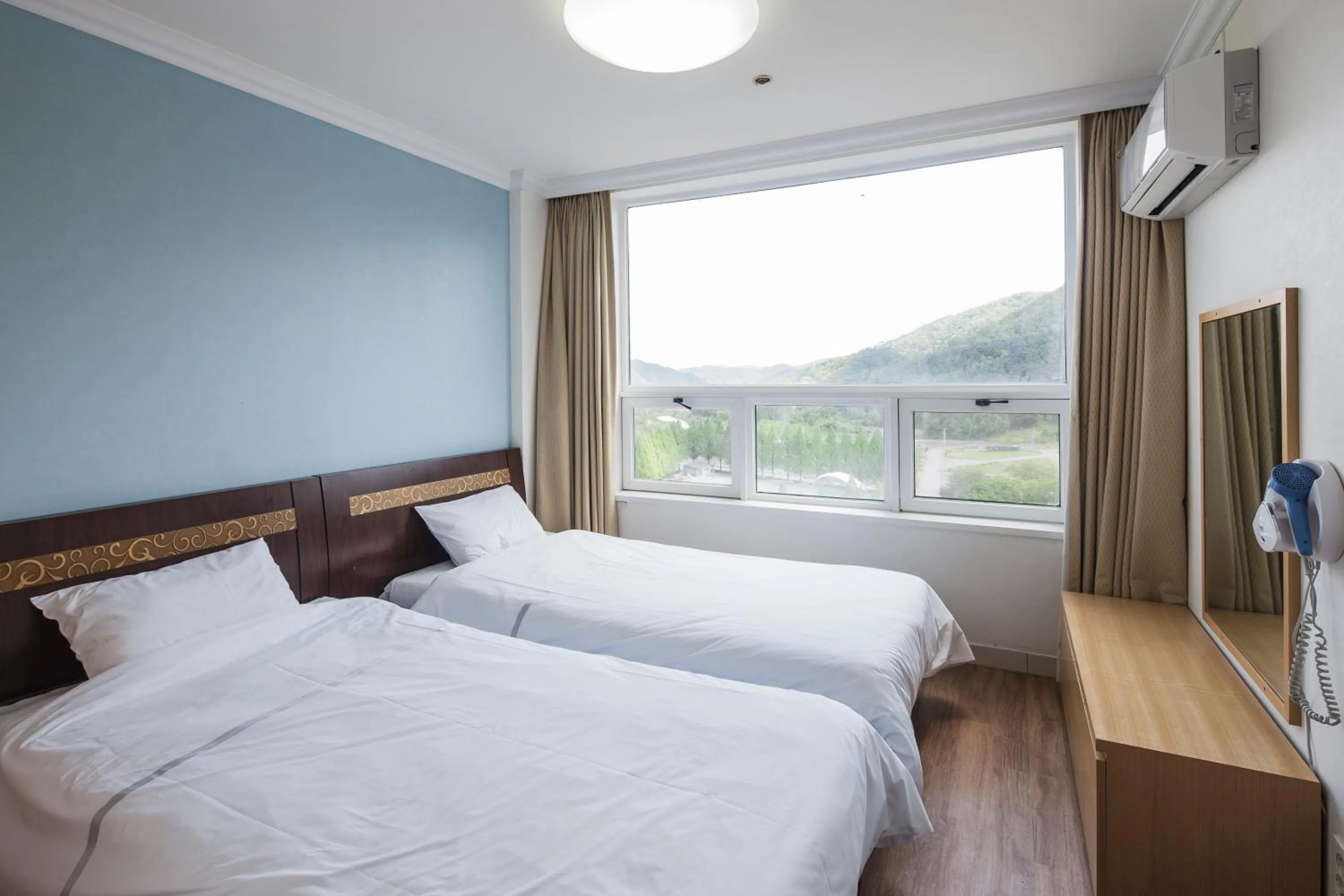 Bed in Kumho Hwasun Spa Resort