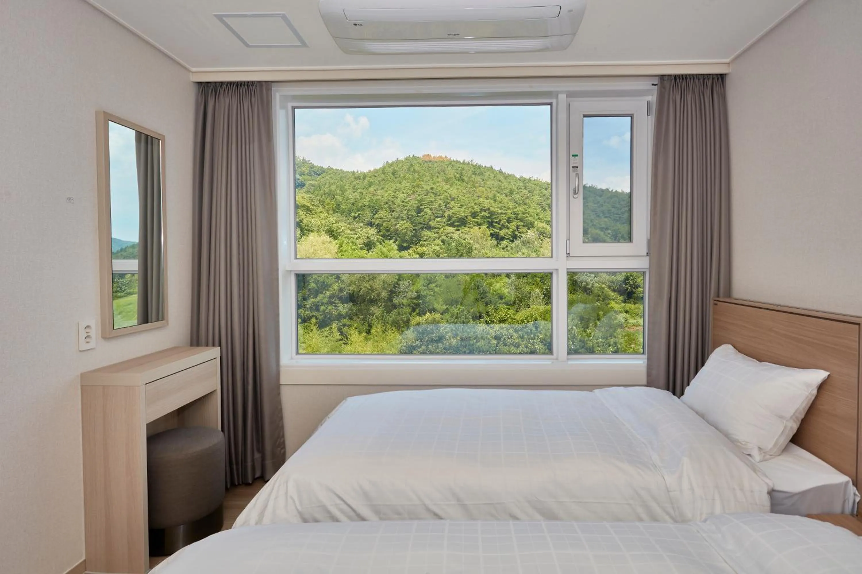 Bed in Kumho Hwasun Spa Resort