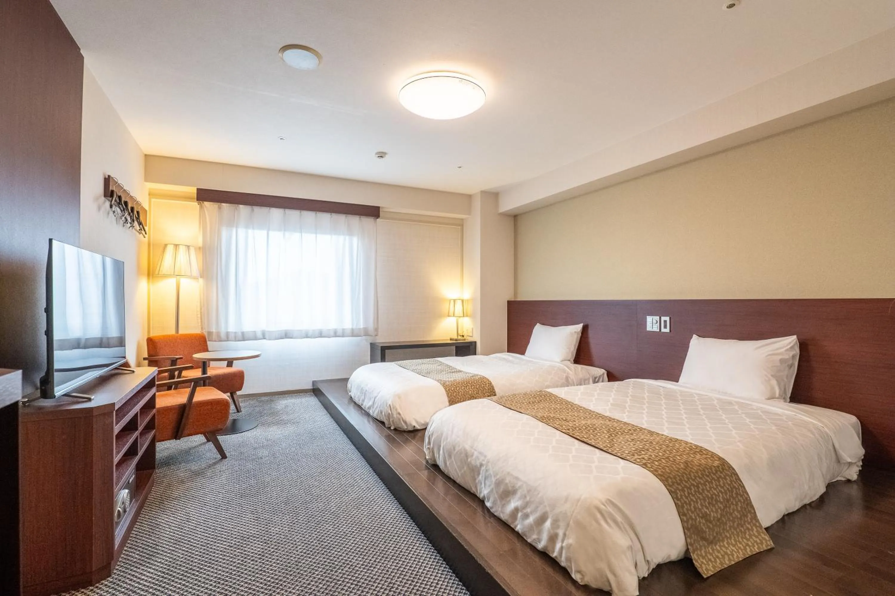 Photo of the whole room, Bed in -SPA RESORT- Nagoya Kasadera Hotel