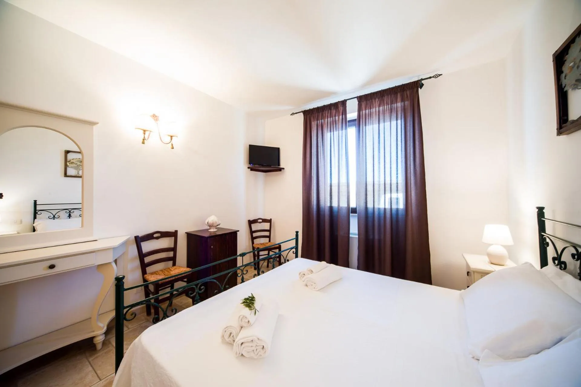 Bed in Trulli Nuova Aia Resort