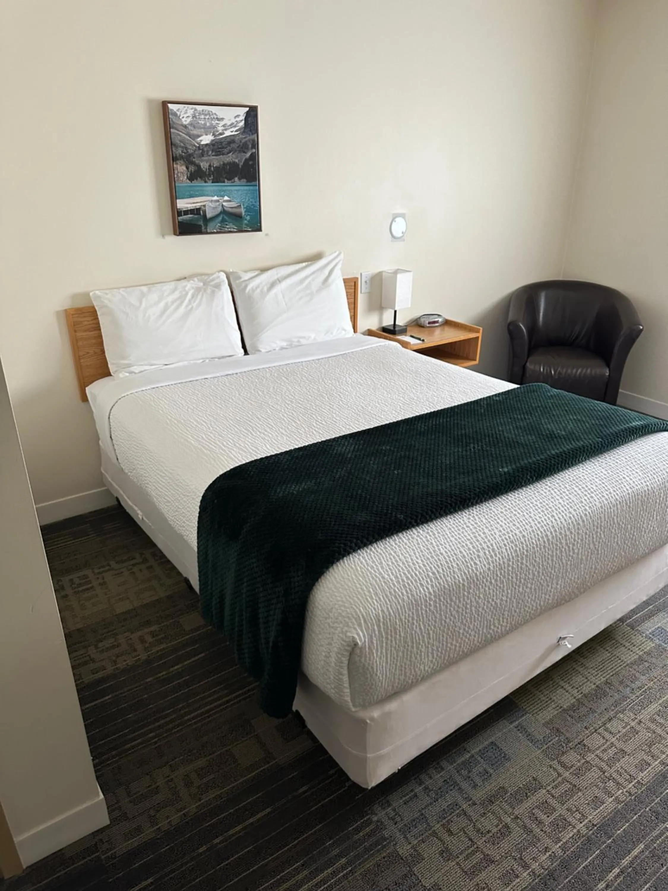 Bed in Sleep Suite Motel