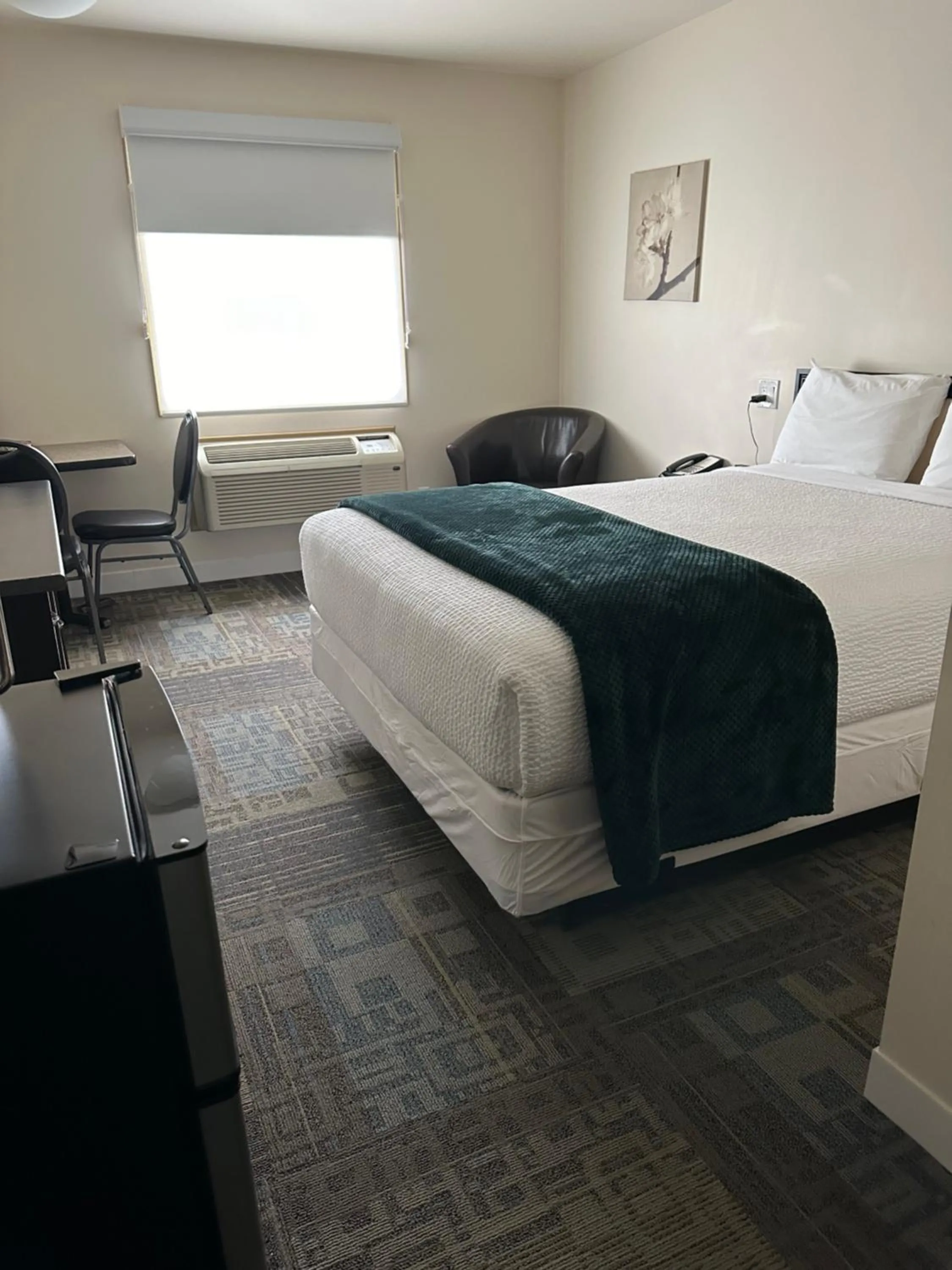 Bed in Sleep Suite Motel