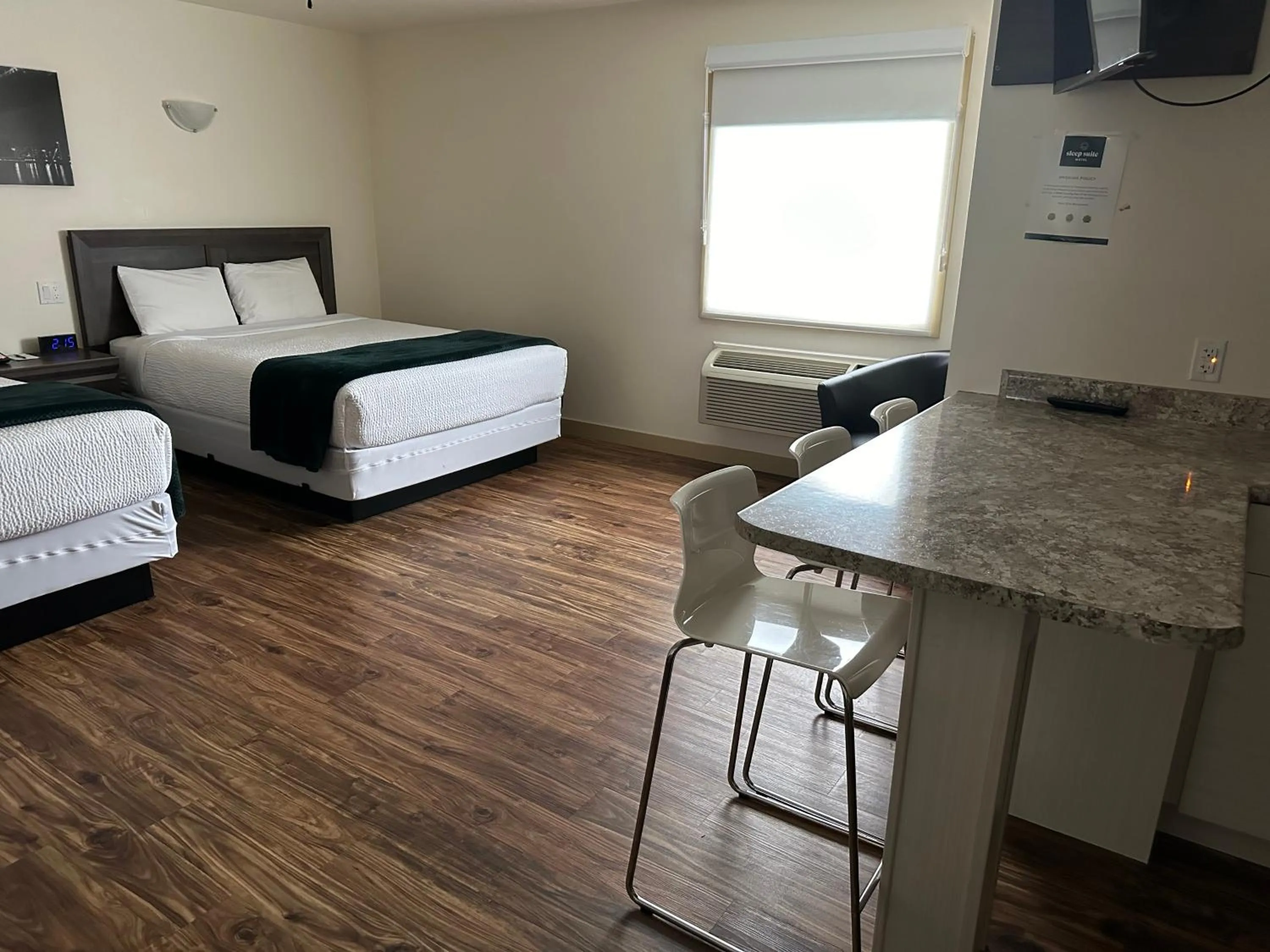 Bed in Sleep Suite Motel