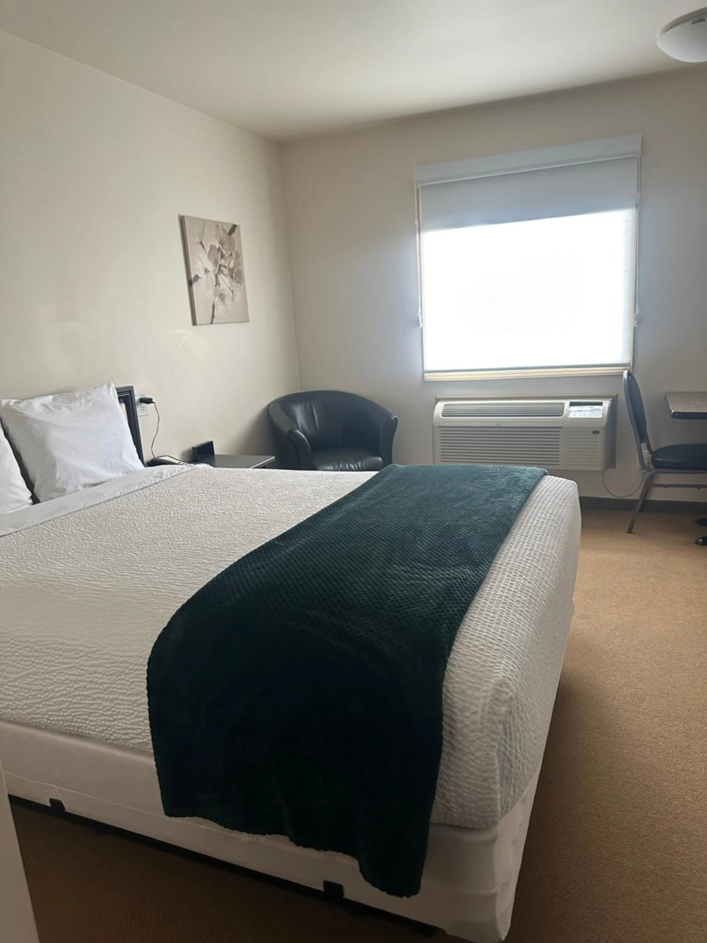 Bed in Sleep Suite Motel