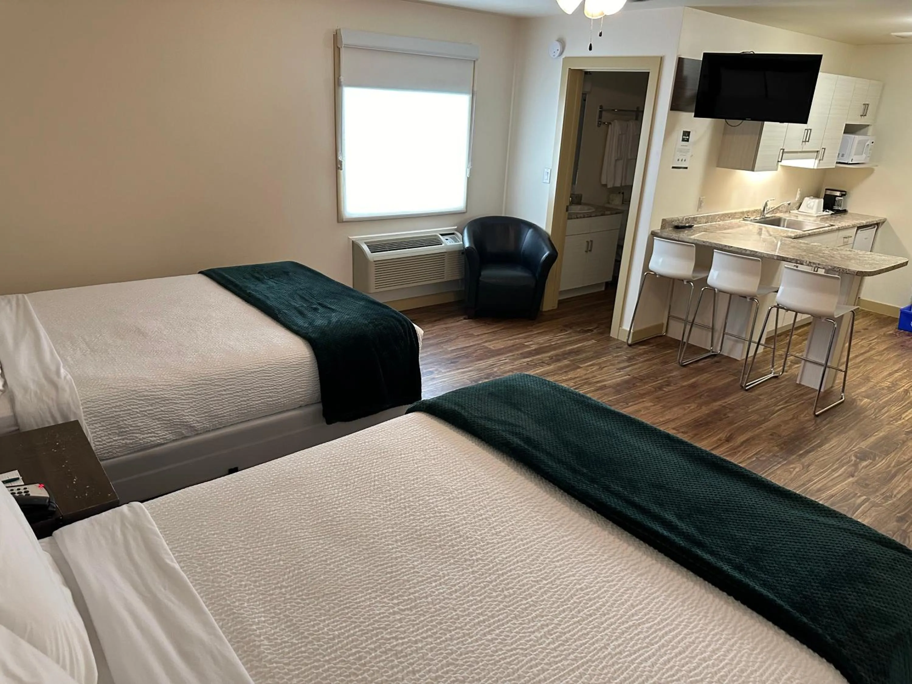 Bed in Sleep Suite Motel