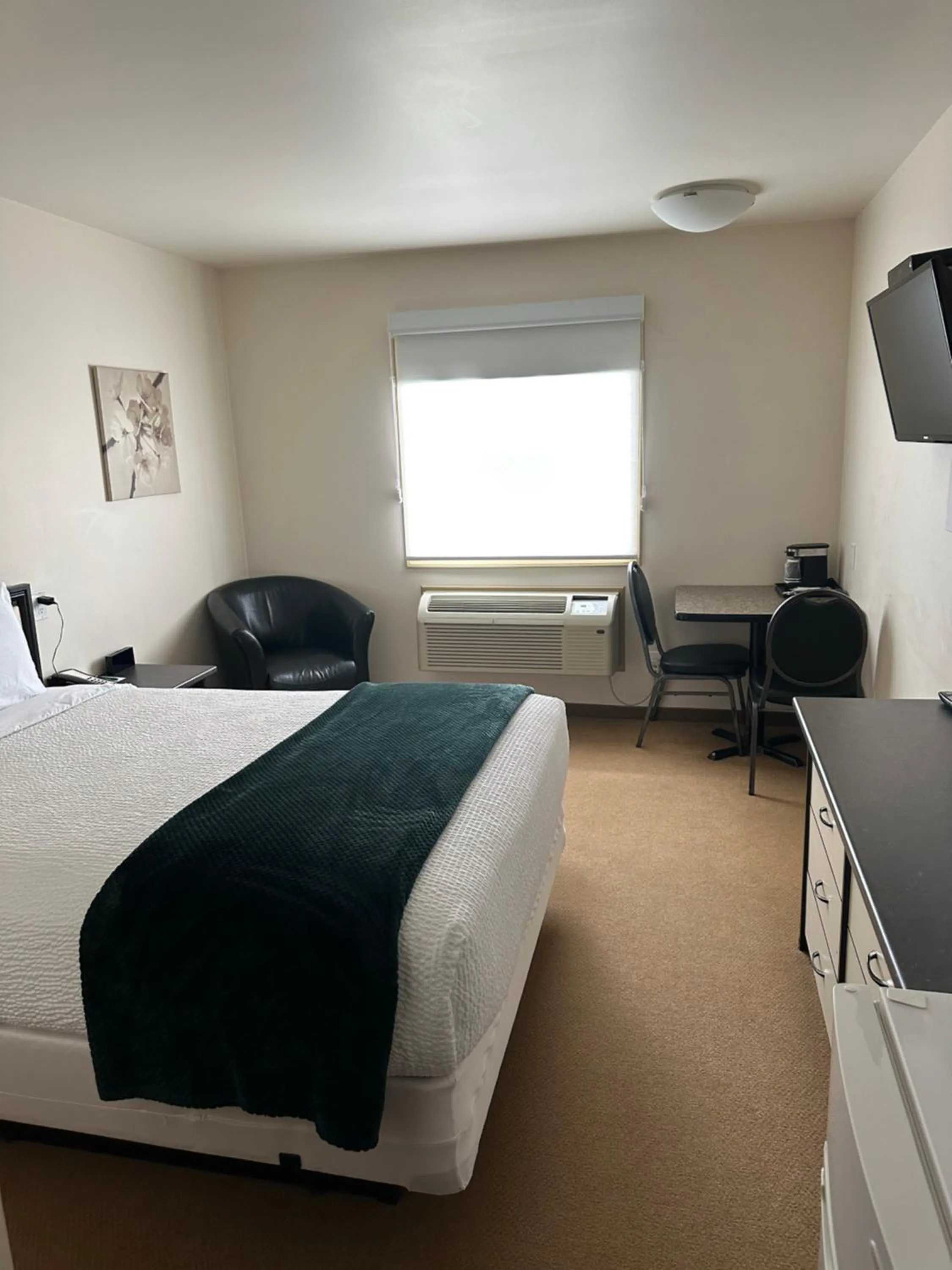 Bed in Sleep Suite Motel