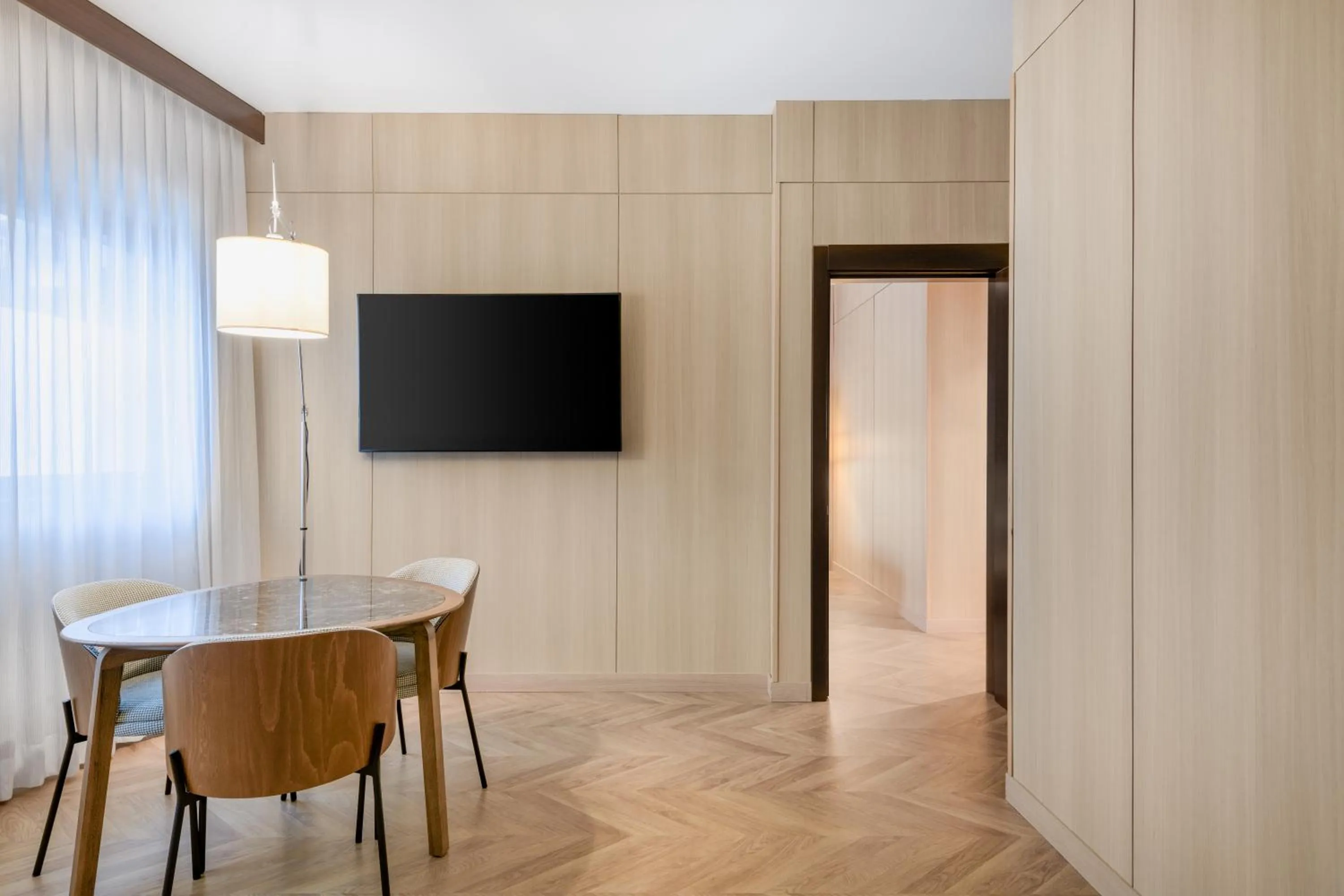 Communal lounge/ TV room in AC Hotel Milano by Marriott