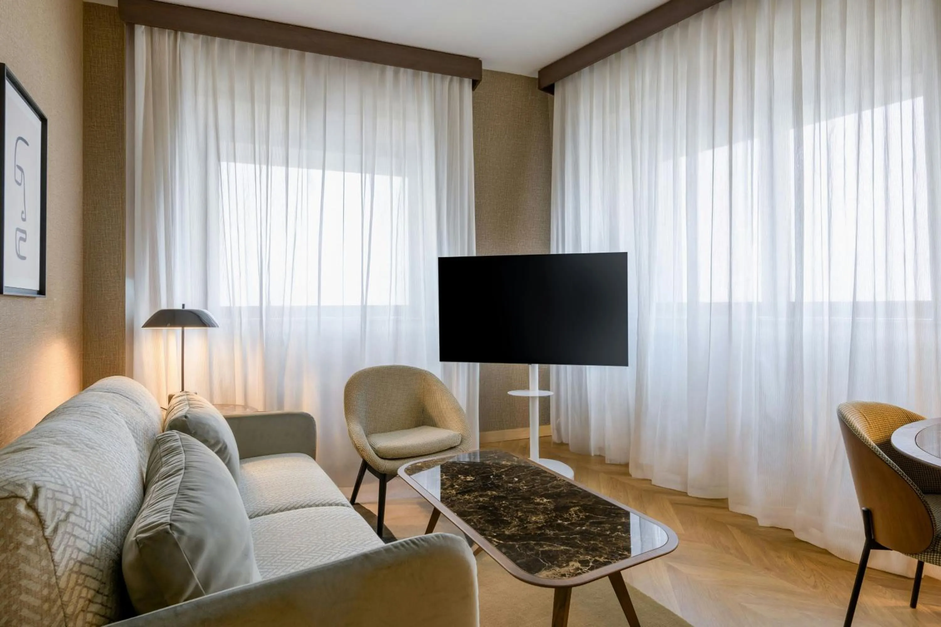 Photo of the whole room in AC Hotel Milano by Marriott