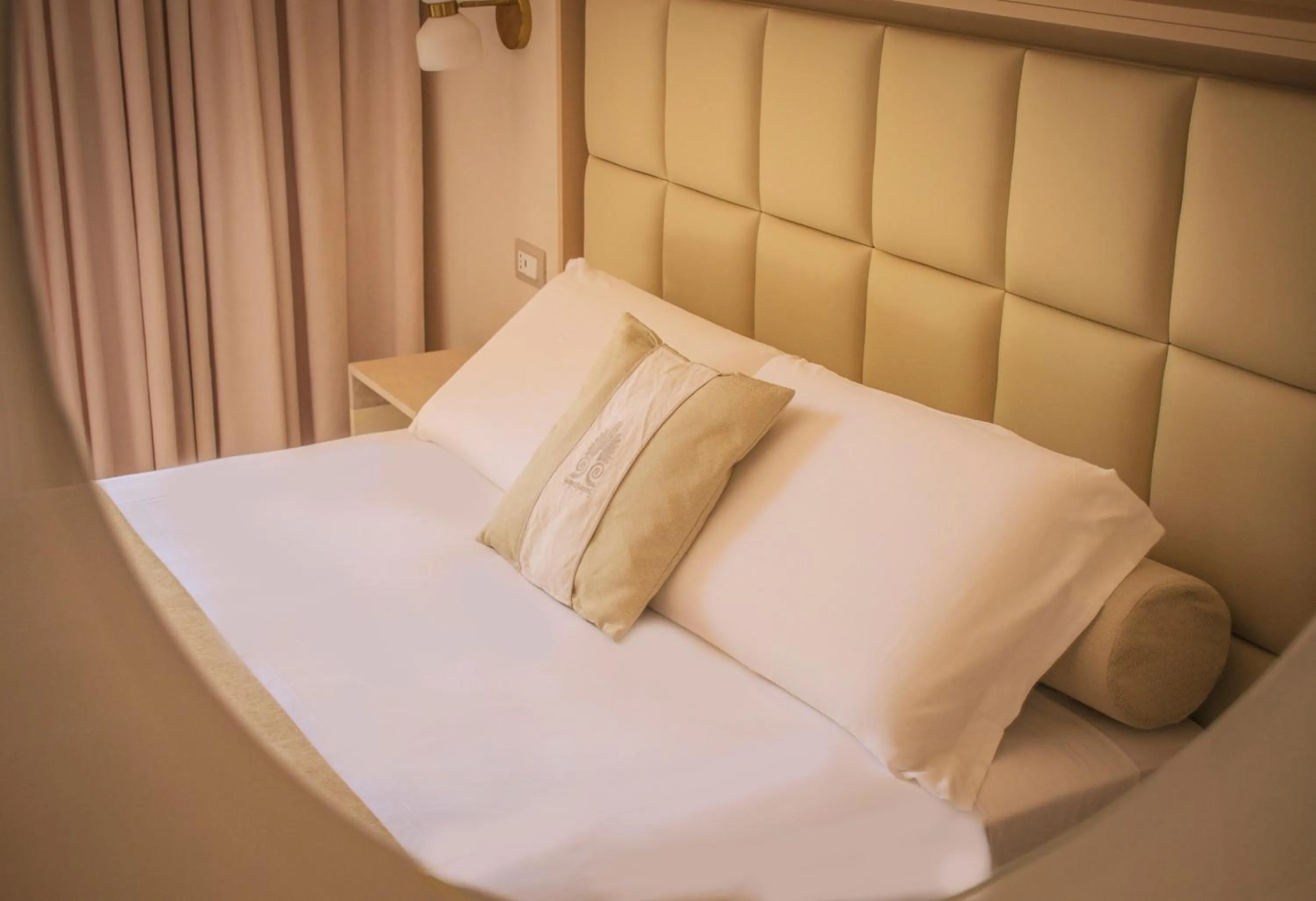 Bed in Donnarumma Hotel