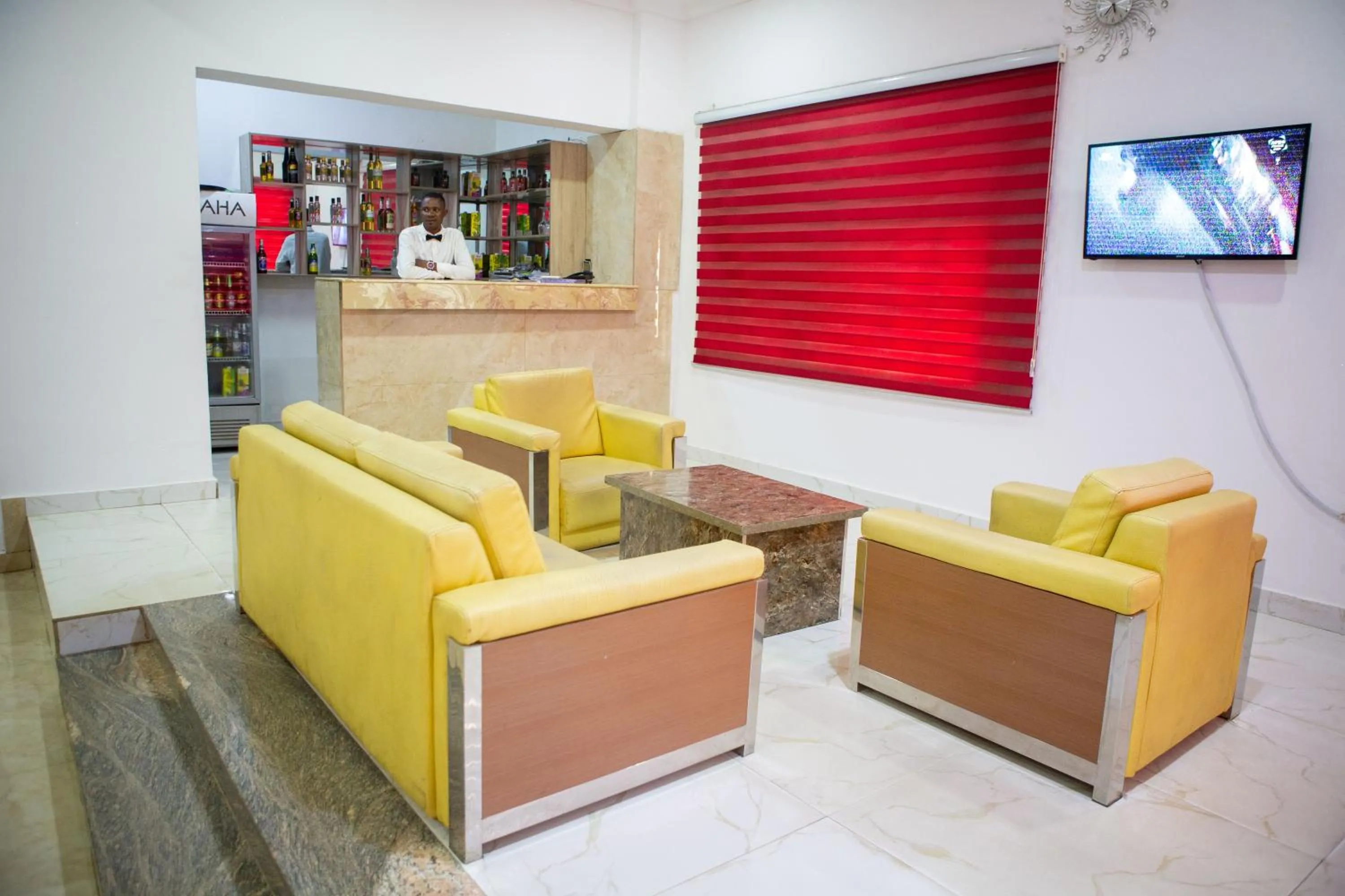 Lounge or bar in ROSES REGENCY HOTEL AND SUITES