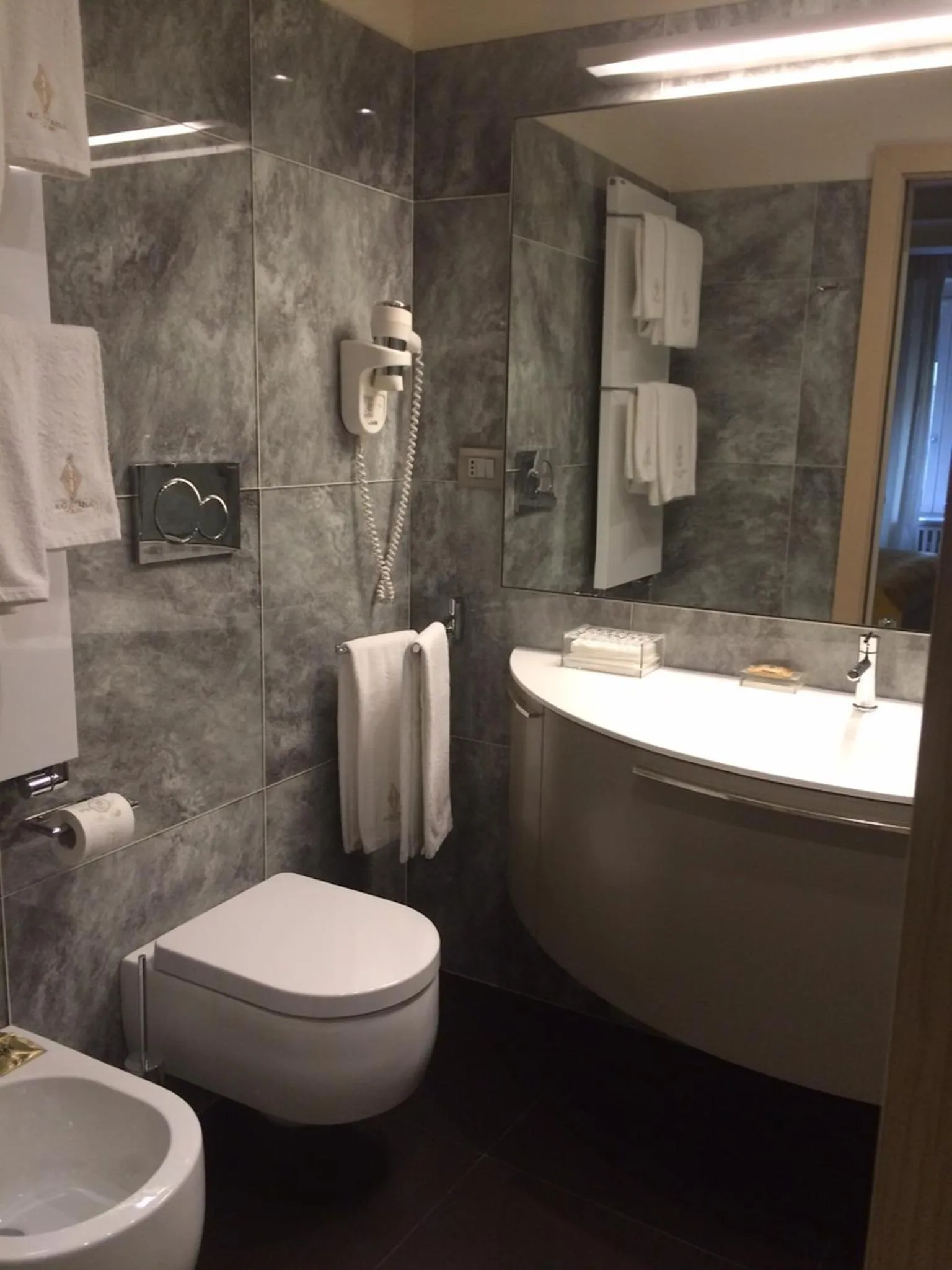 Bathroom in Augustana House and Suites