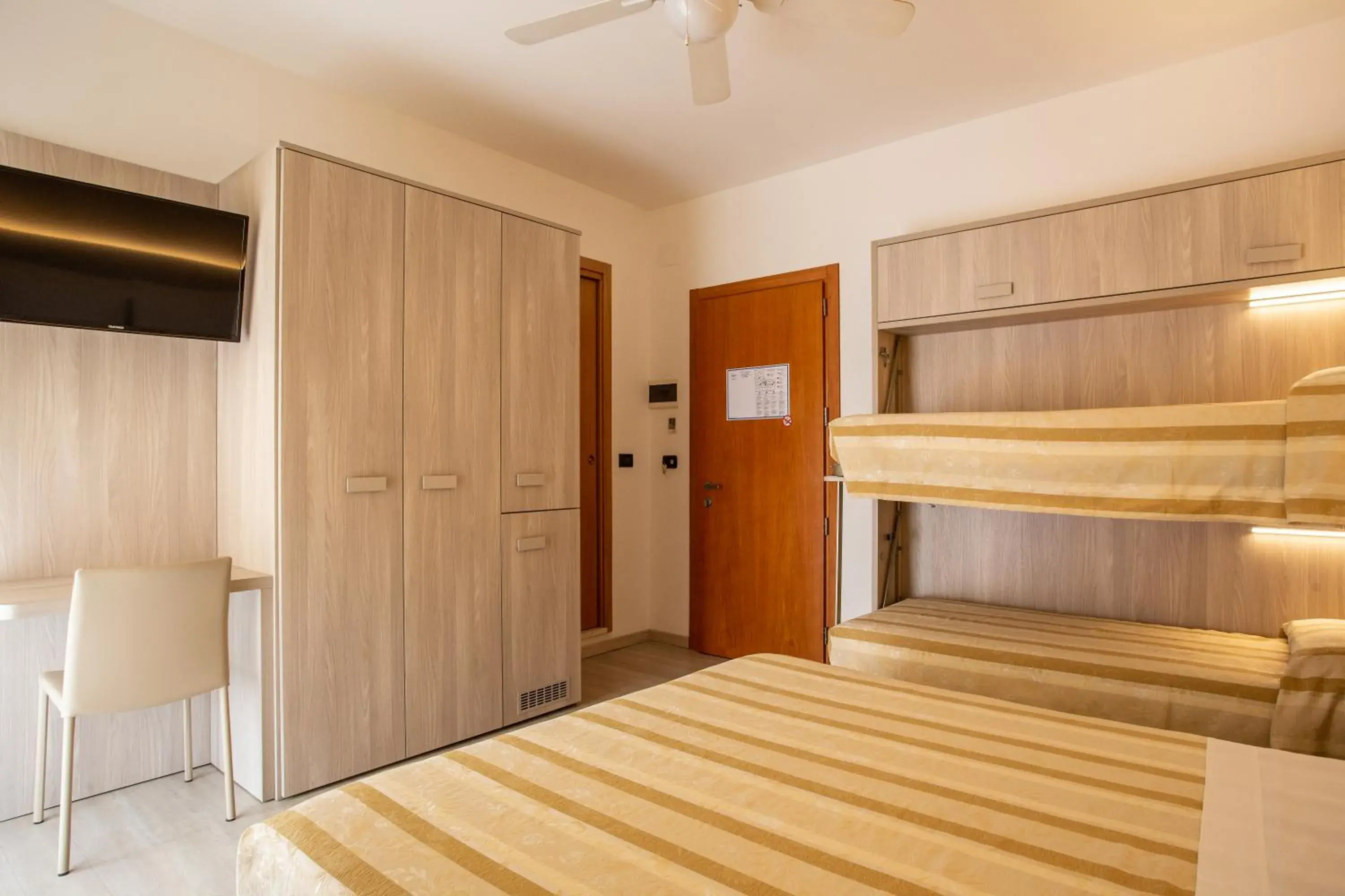 Quadruple Room with Balcony in Hotel Angelo Quadruple Room with Balcony in Hotel Angelo