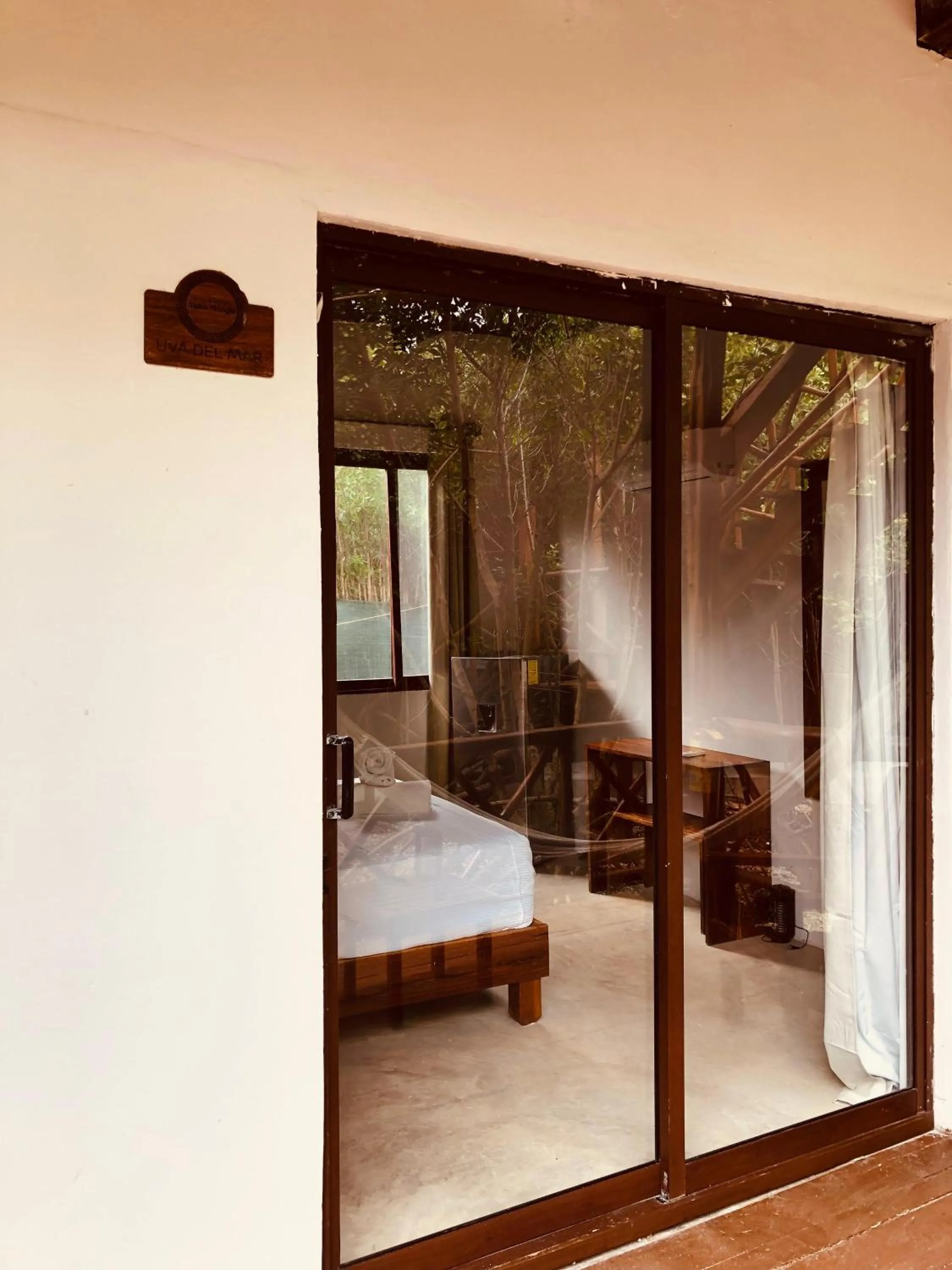 Photo of the whole room in Cabañas Tulum - Aldea Mangle & Cenote