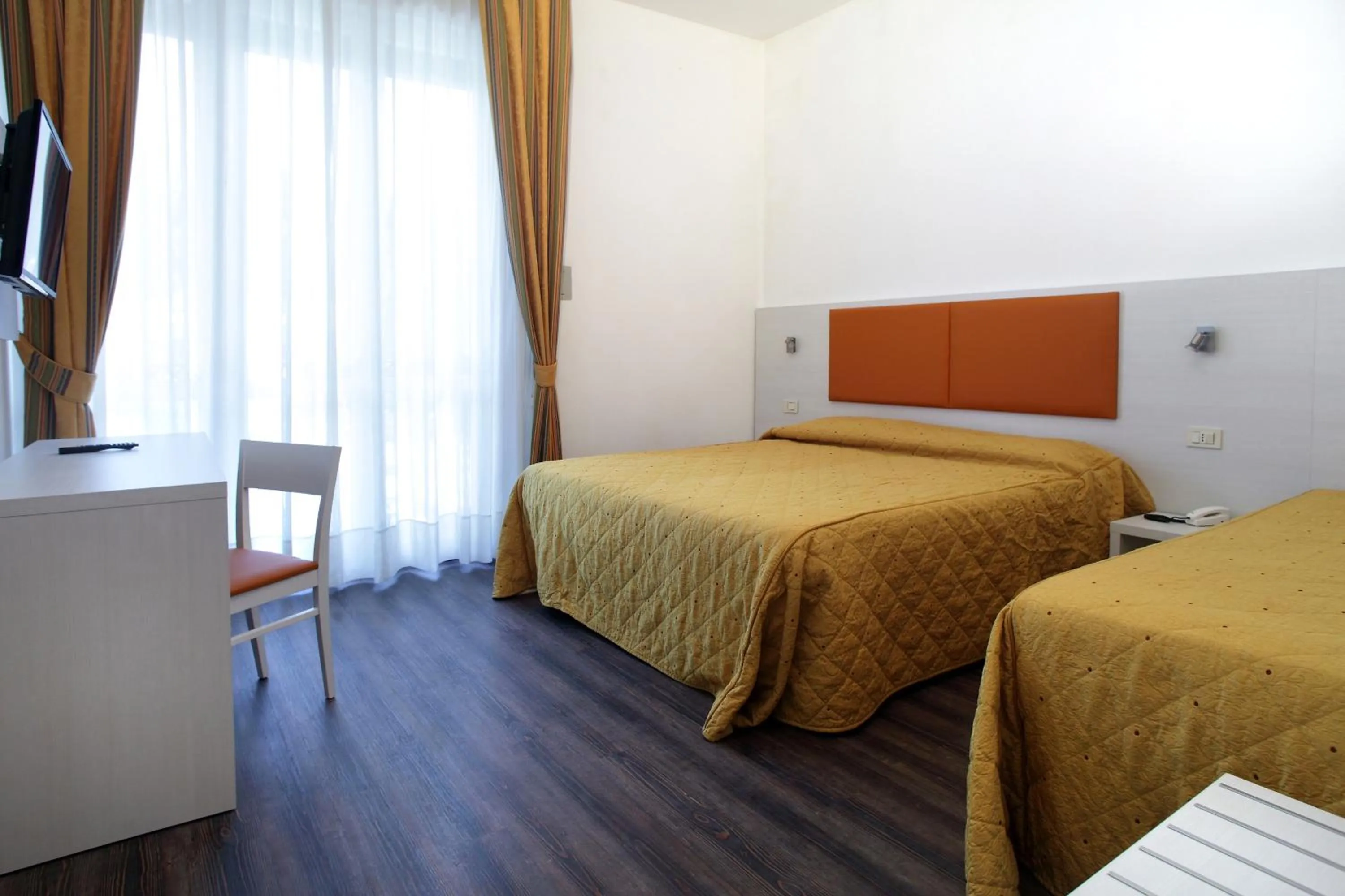 Bed in Arianna Hotel