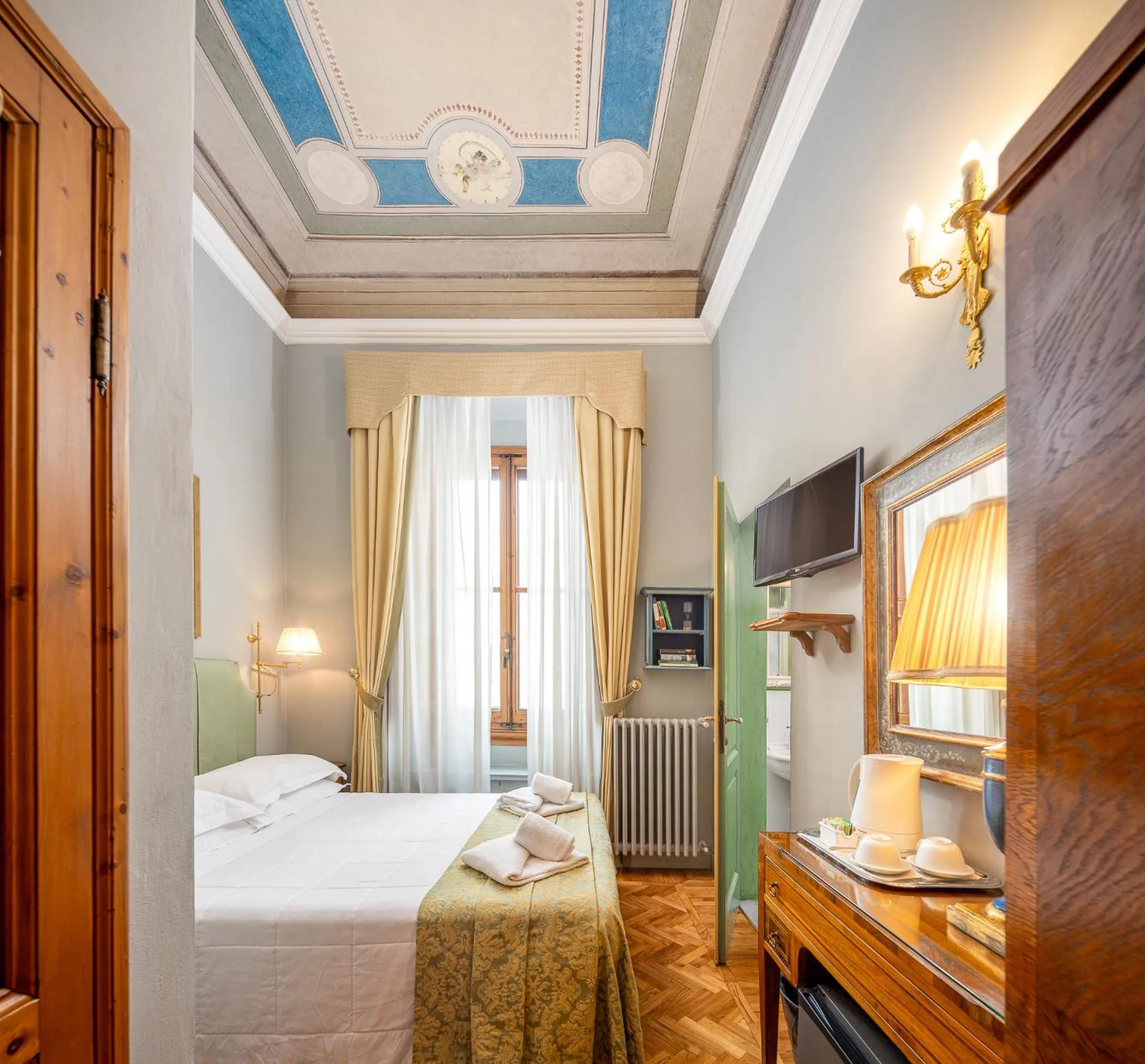 Bed in Il Marzocco Boutique B&B