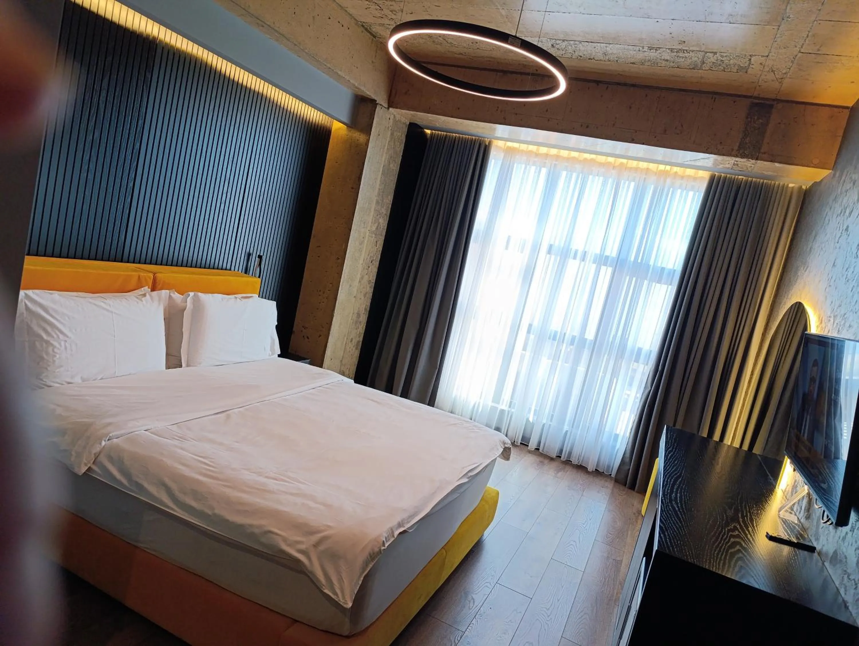 Bed in Toka Hotel Restaurant