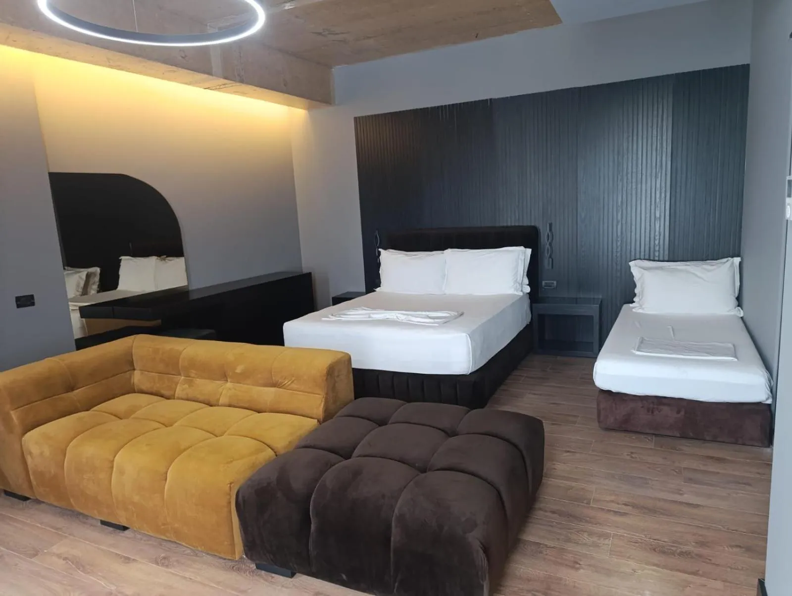 Seating area, Bed in Toka Hotel Restaurant