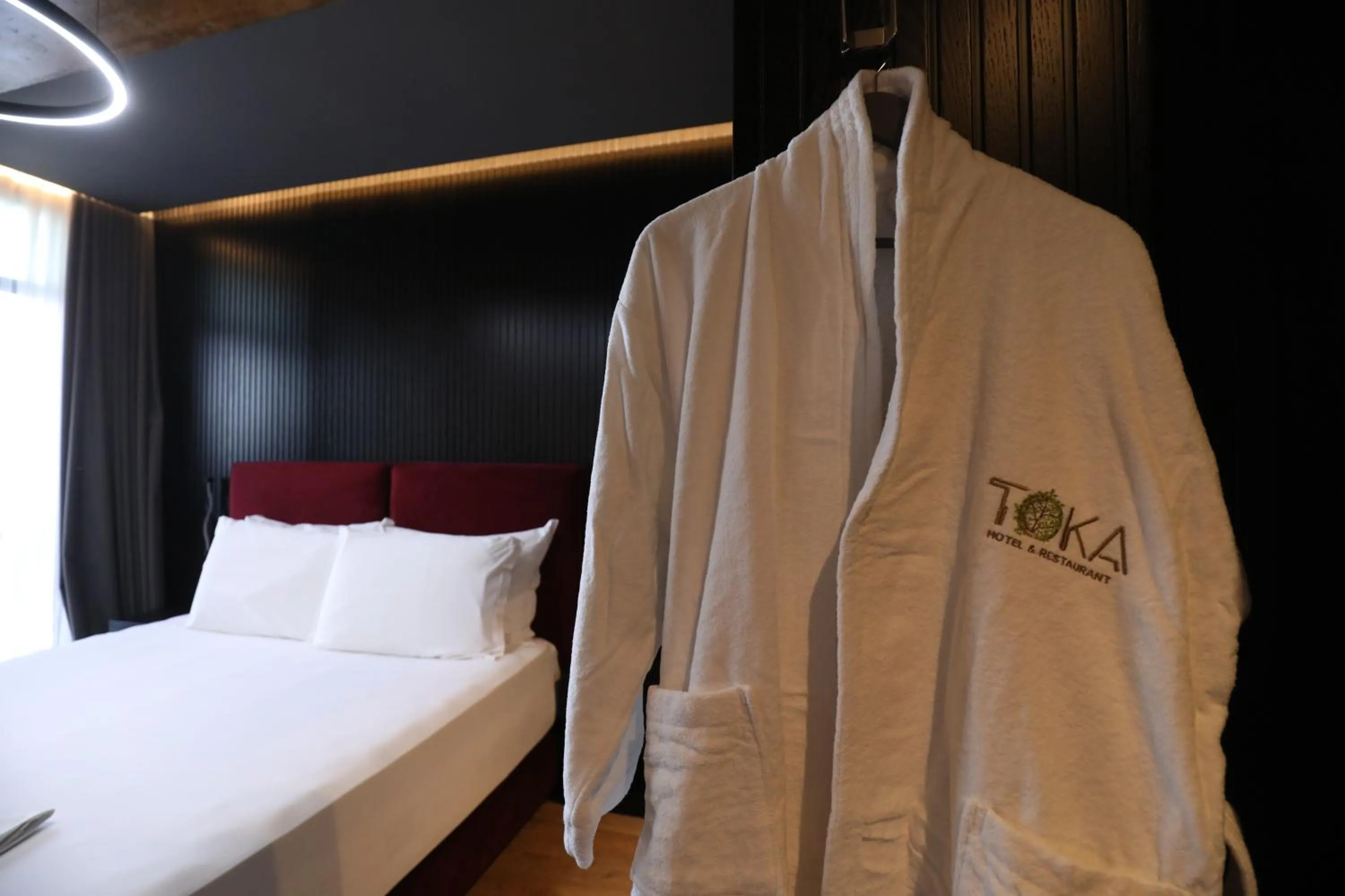 Bed in Toka Hotel Restaurant