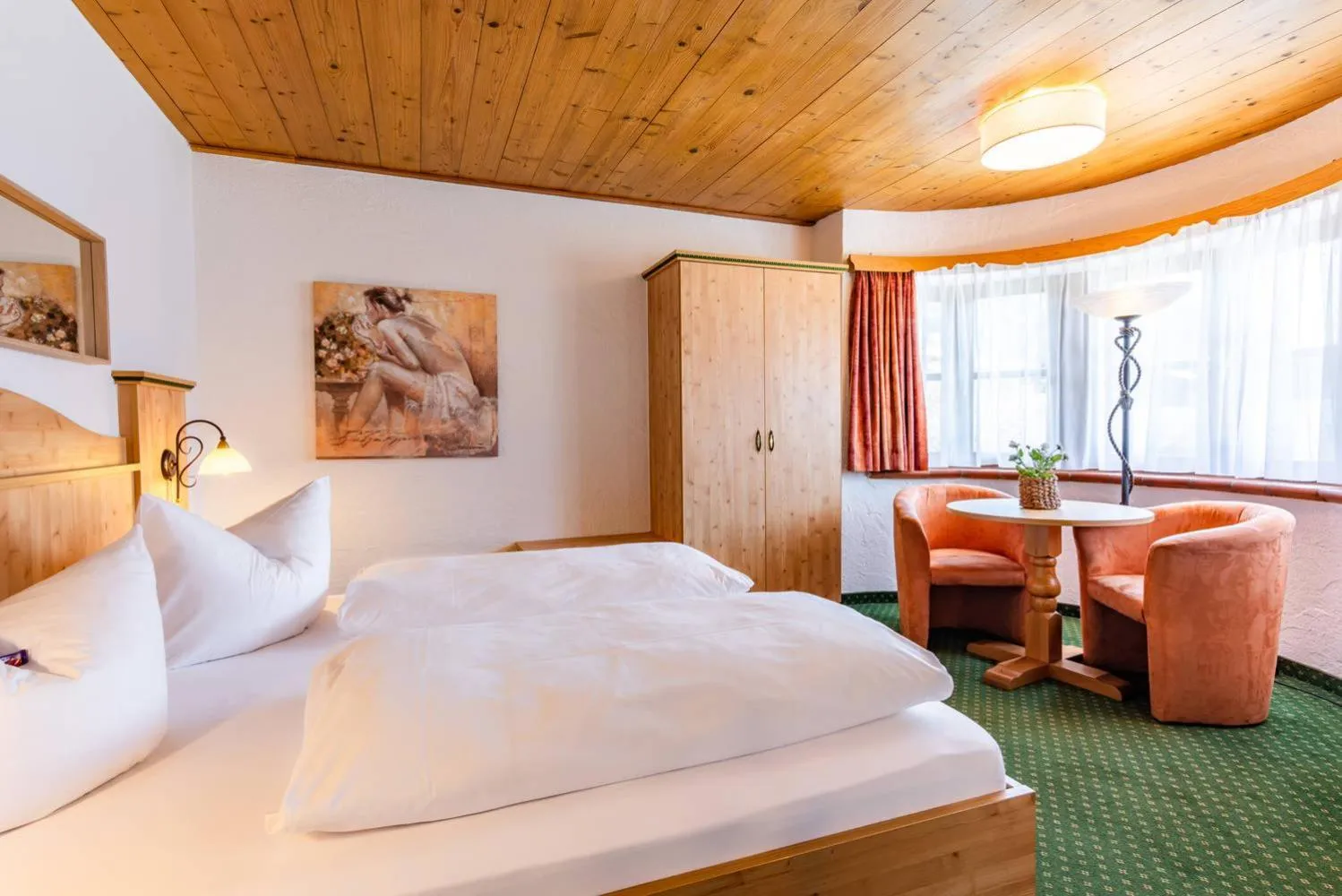 Bed in Das Maximilian - Feines Landhotel am Schliersee