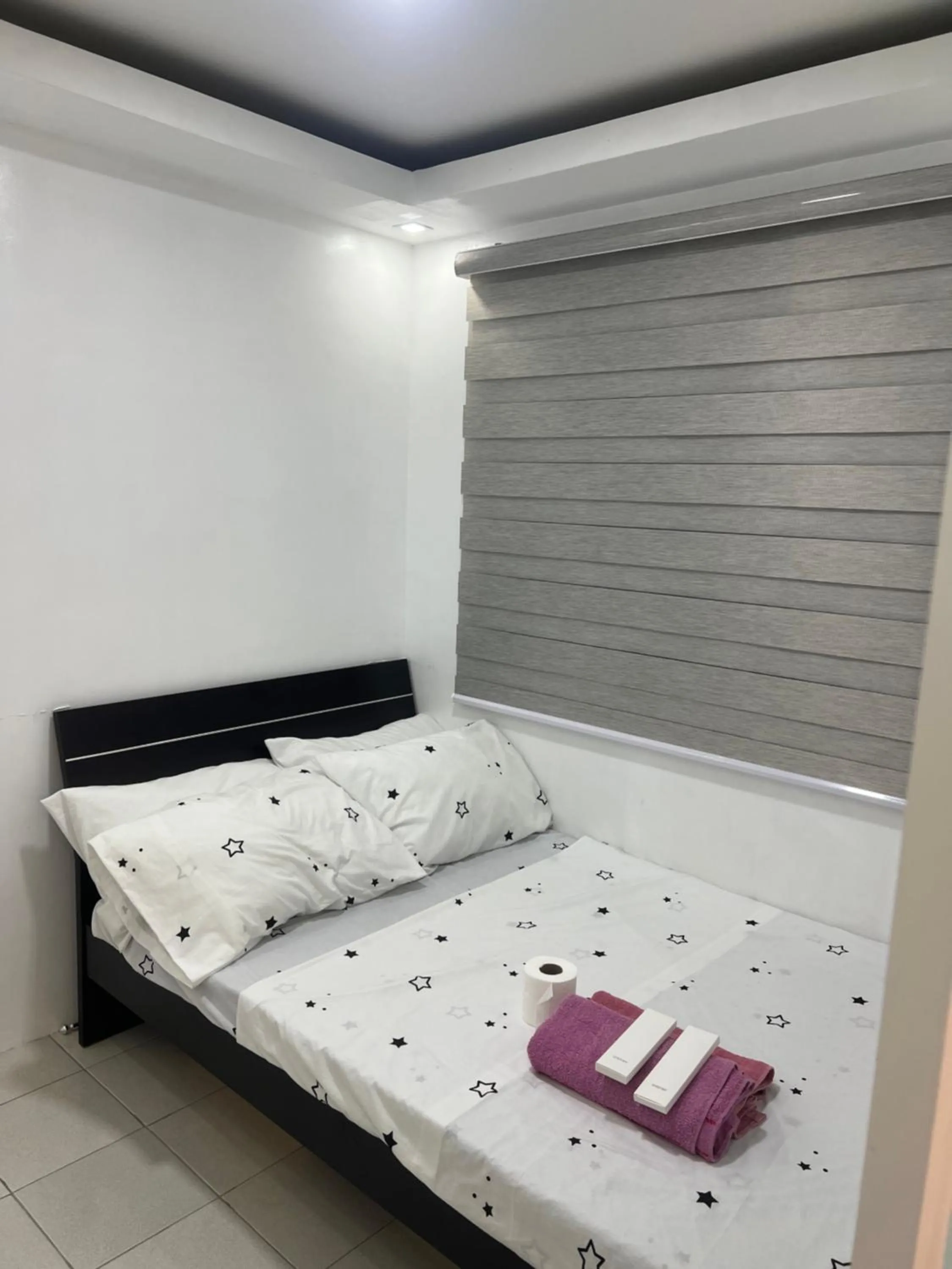 Bed in Cozy Boo Suite near Enchanted kingdom by Dynel