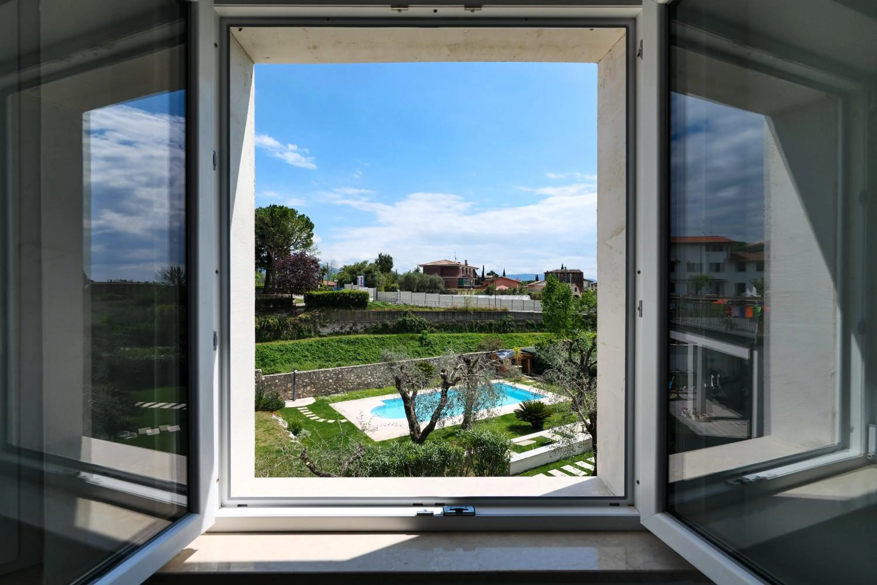 Garden in Borgo degli Ulivi Residence di Olympic Garda Lake