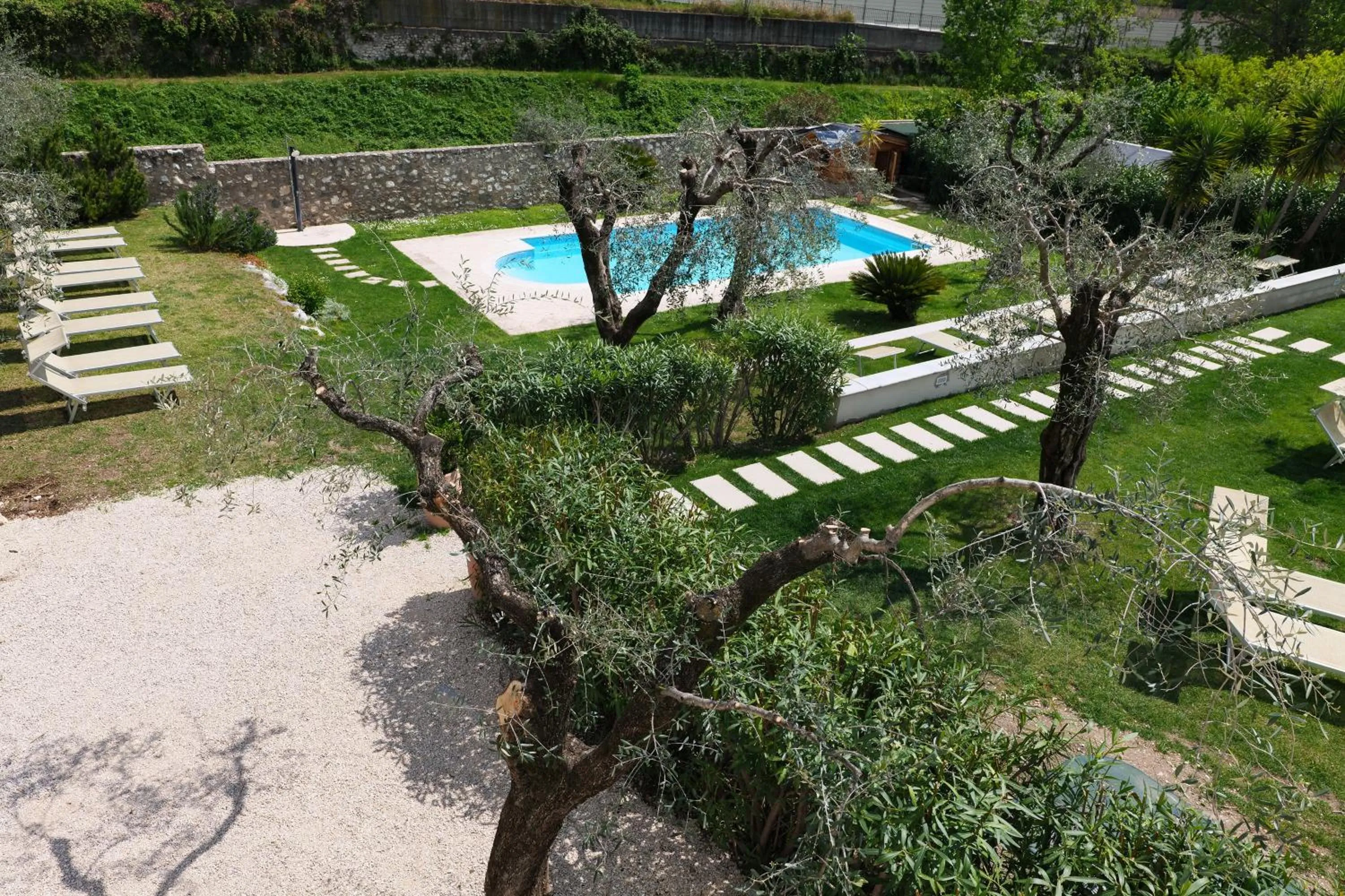 Garden in Borgo degli Ulivi Residence di Olympic Garda Lake