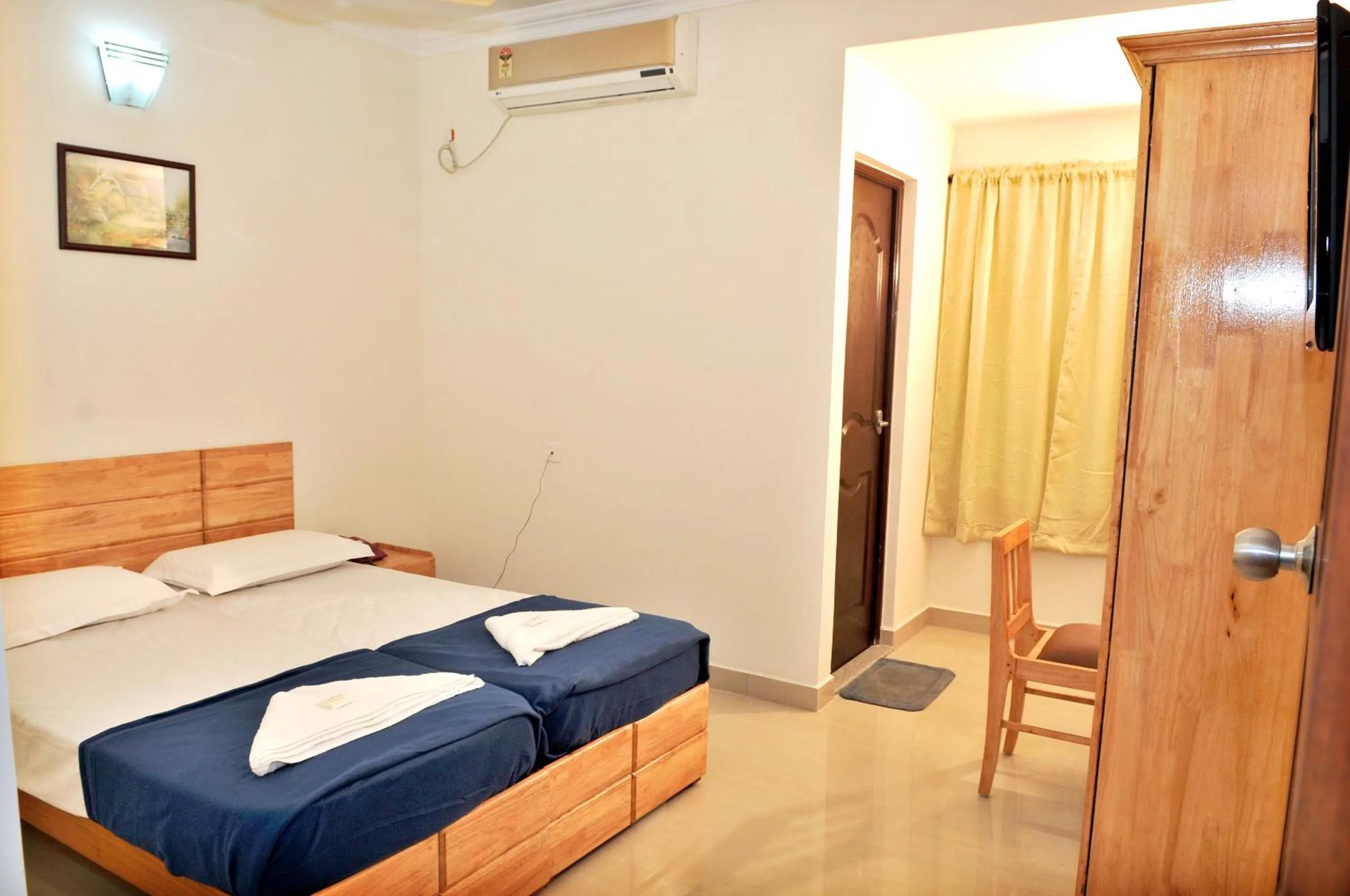 Bed in A V Residency