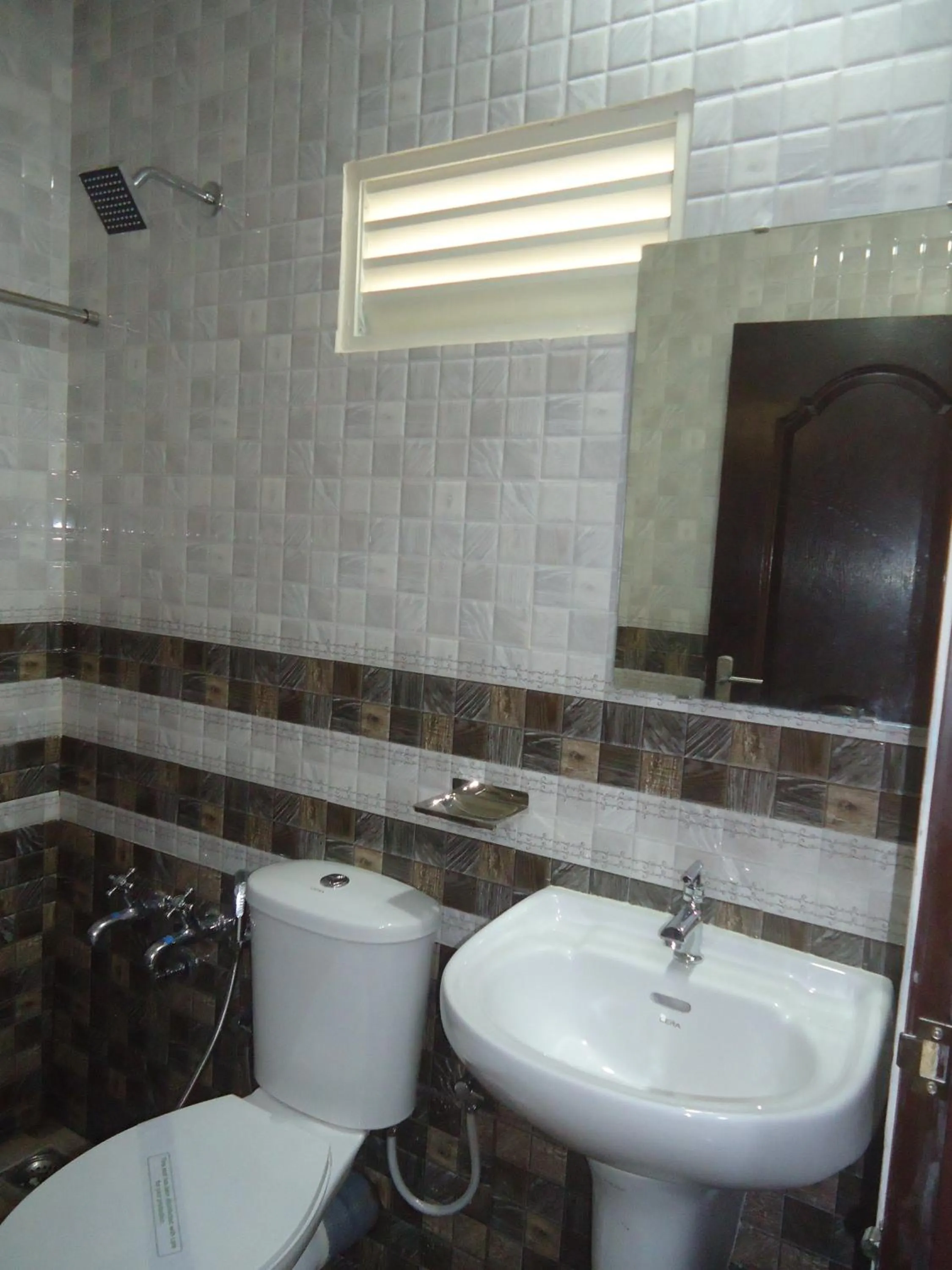 Bathroom in A V Residency