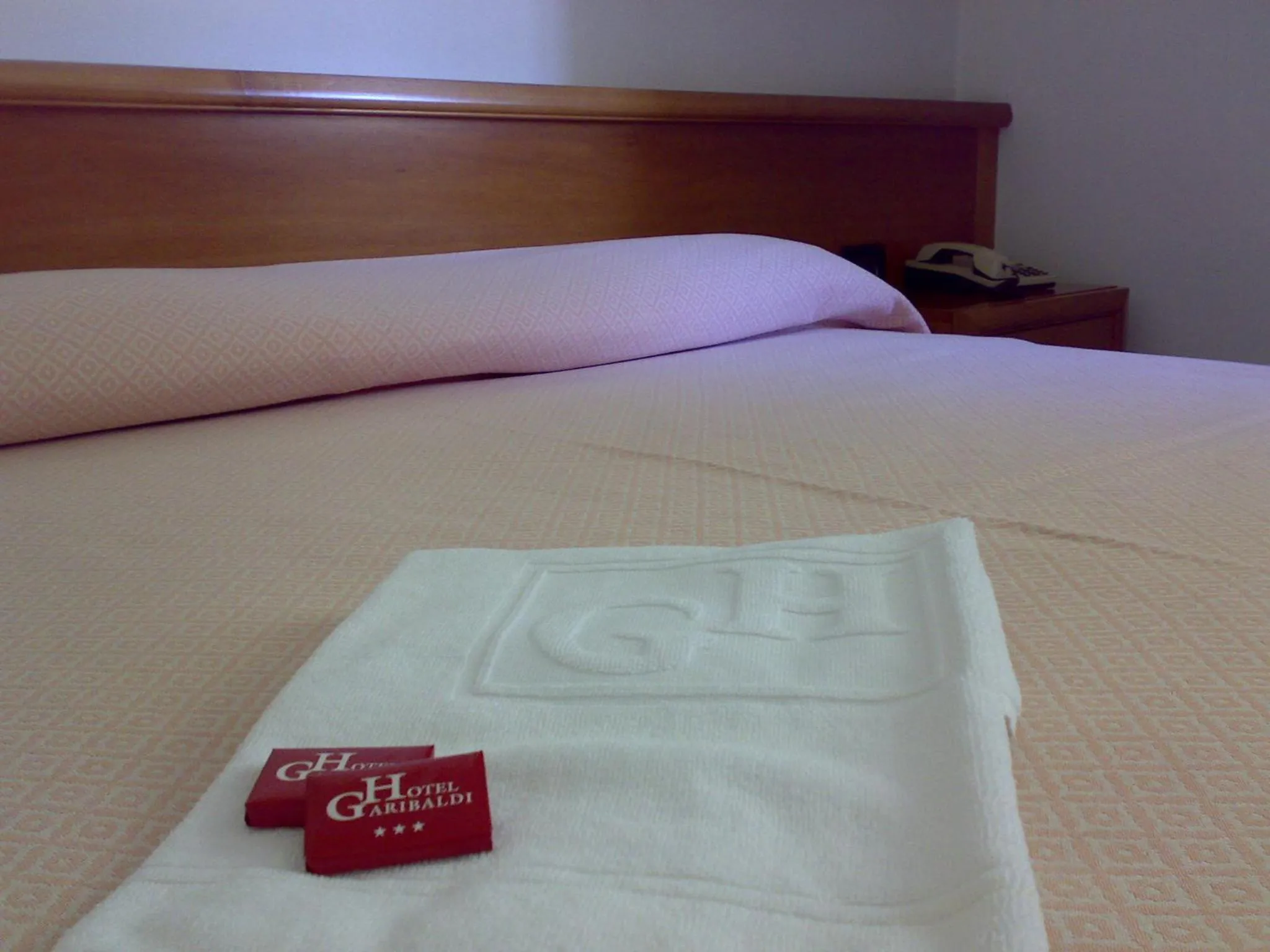 Bed in Hotel Garibaldi