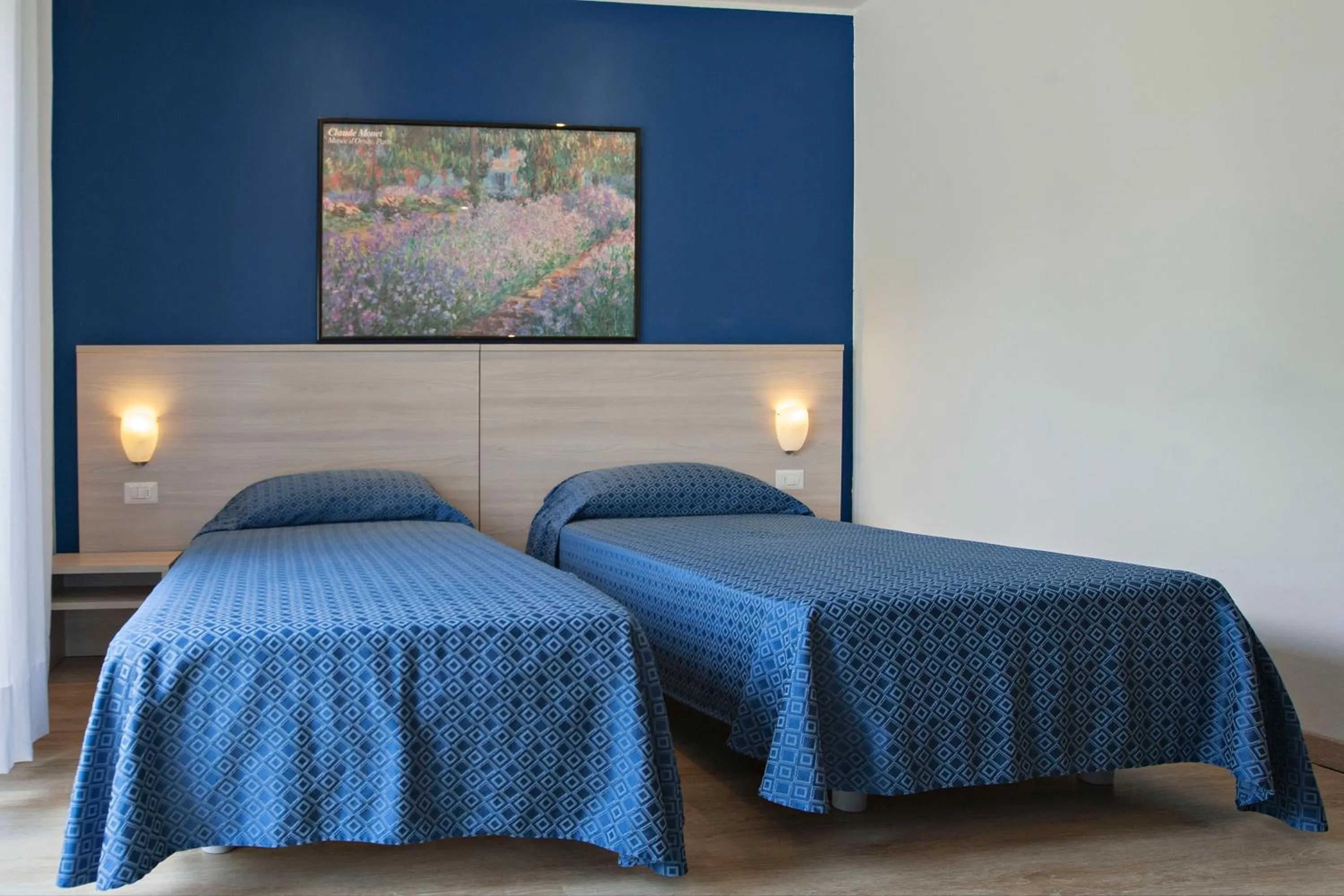 Bed in Hotel Garibaldi