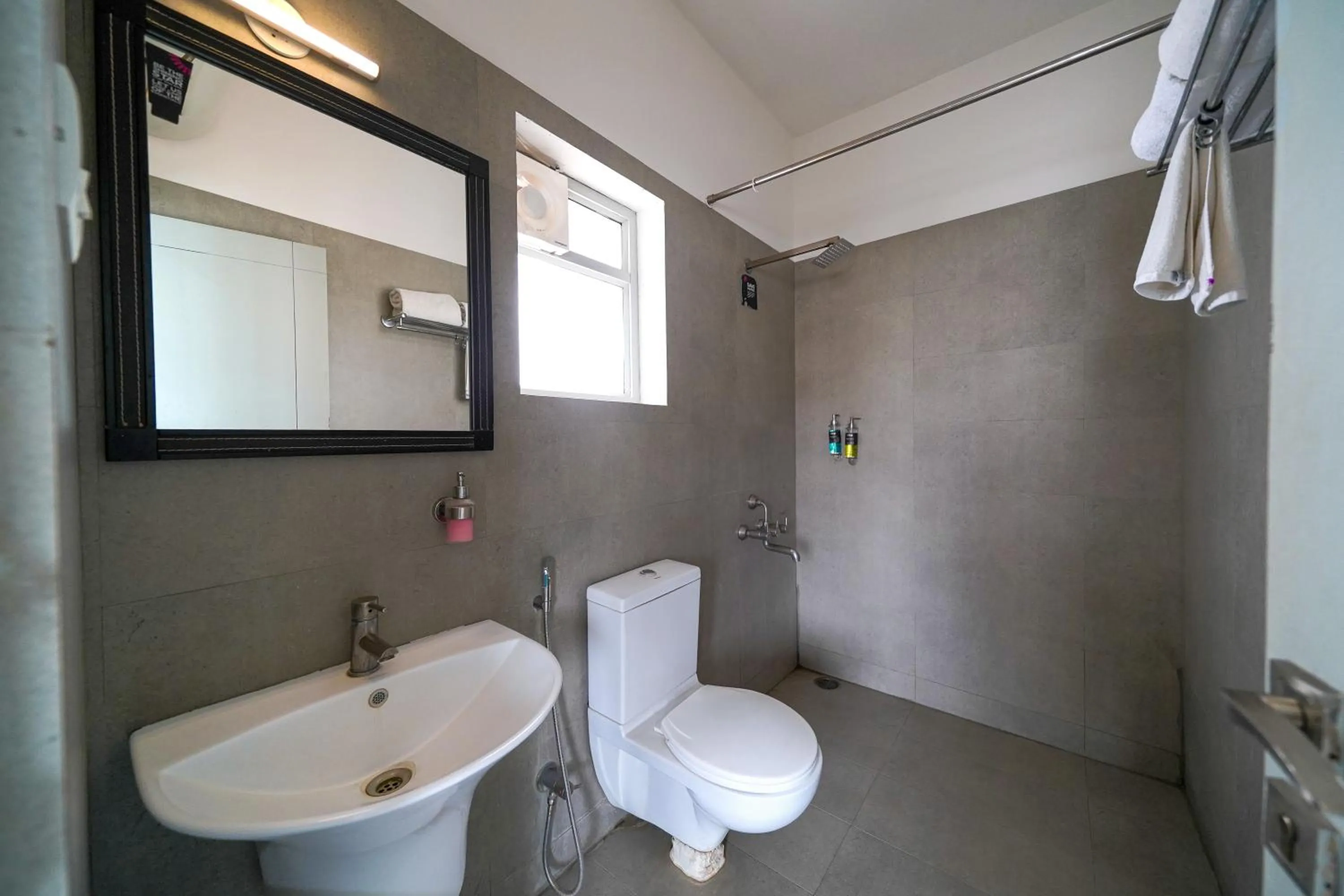 Shower in Olive Zip Koramangala 100Ft Road by Embassy Group